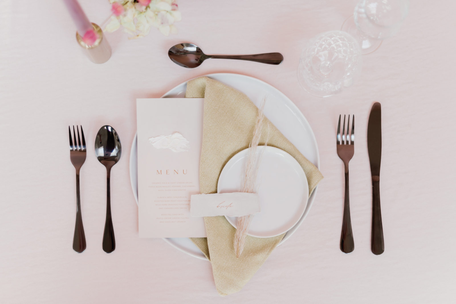 Modern microwedding inspiration tablescape with pink and gold hues