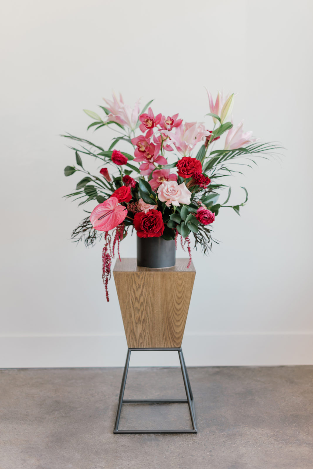Pink, red, and white wedding floral arrangement inspiration for the modern bride and groom