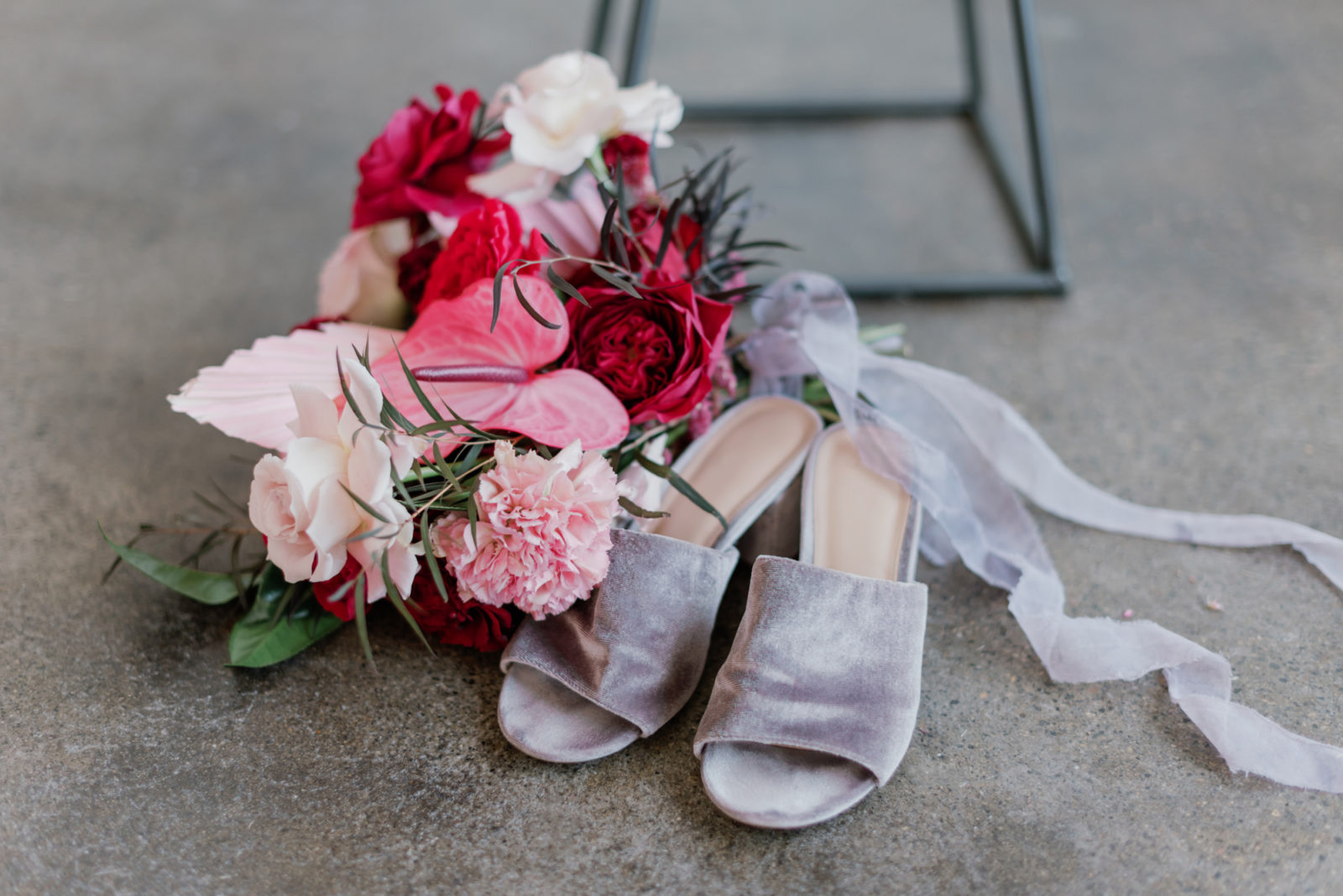 Mauve bridal high heels with a vibrant bridal bouquet 