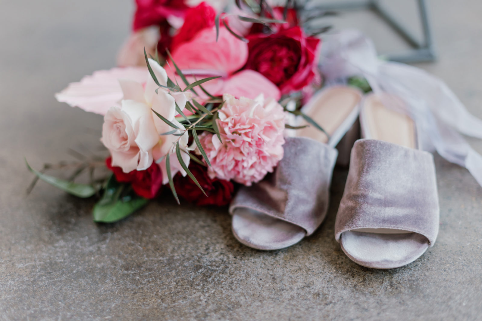 Mauve bridal heels with vibrant pink flowers for this modern microwedding inspiration editorial