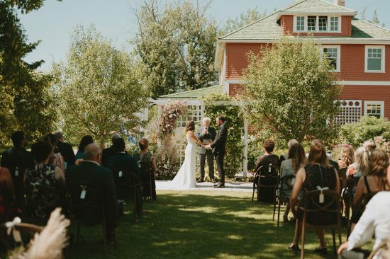 Outdoor wedding ceremony at Deane House in Calgary Alberta