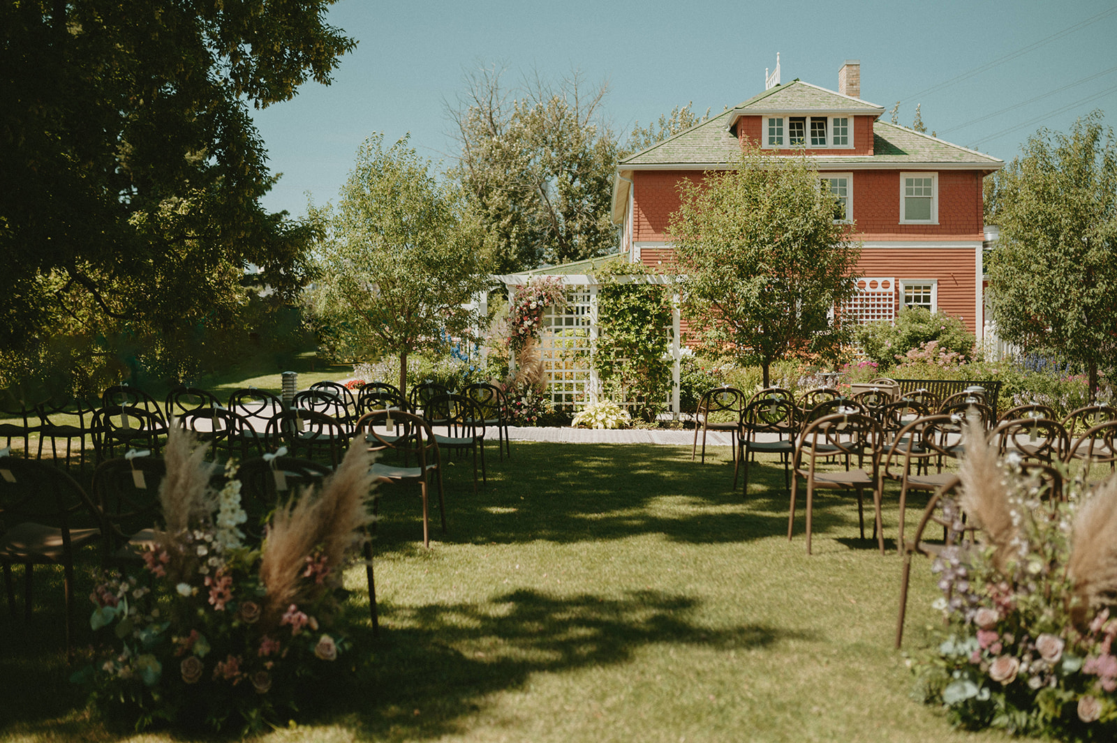 Outdoor wedding ceremony setup at Deane House Calgary 