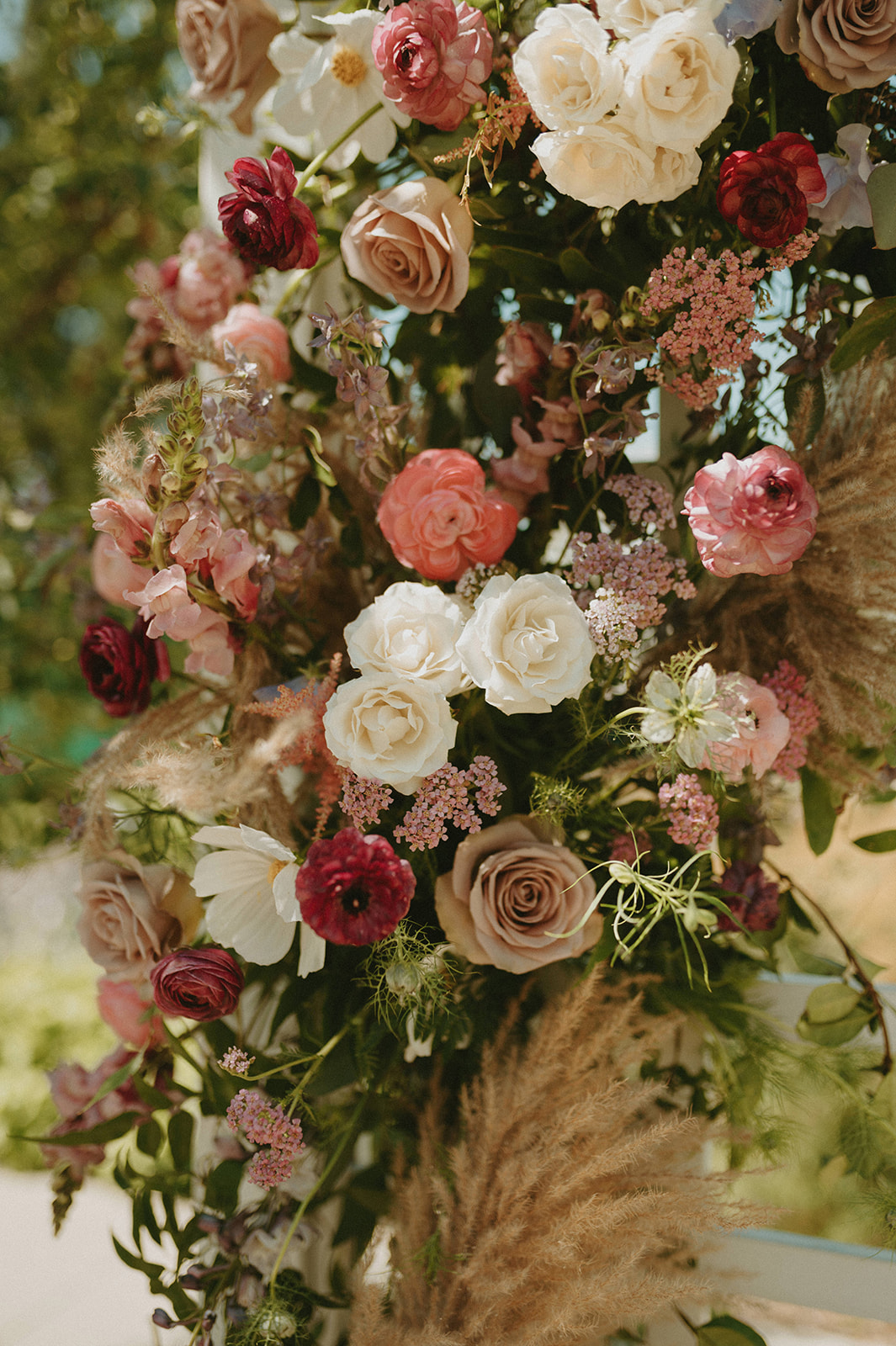 Blush, berry and gold floral inspiration for a floral arch installation