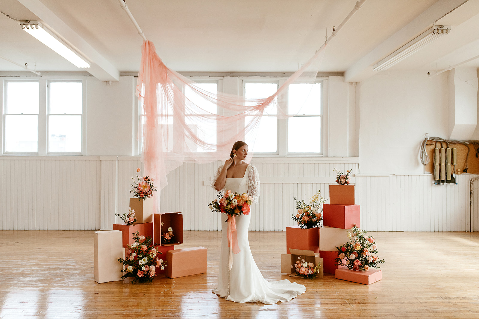 Citrus editorial with boho bridal style featuring hanging fabric installation for this unique DIY ceremony