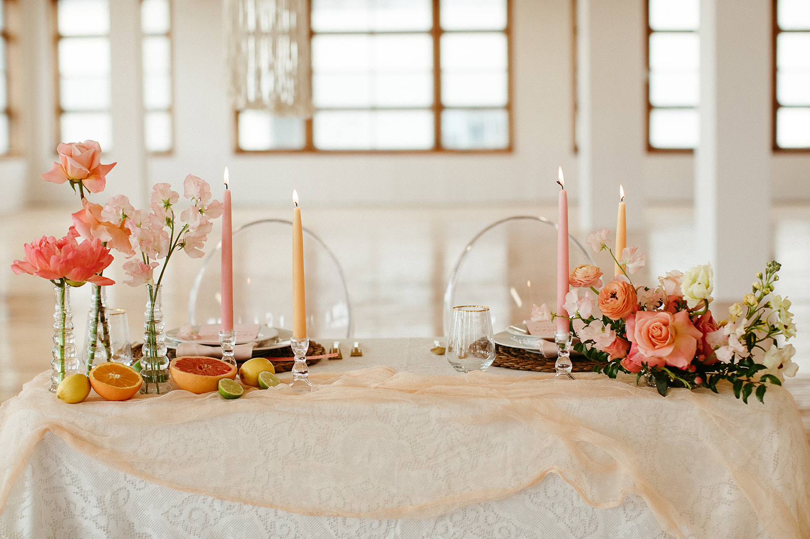 Dreamy tablescape design for a boho wedding with bold citrus details 