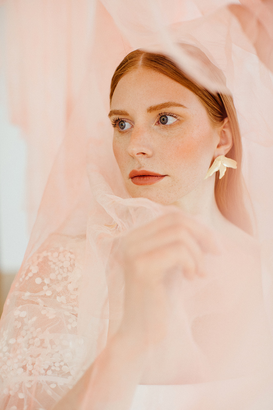Sleek bridal style with silky peach fabric