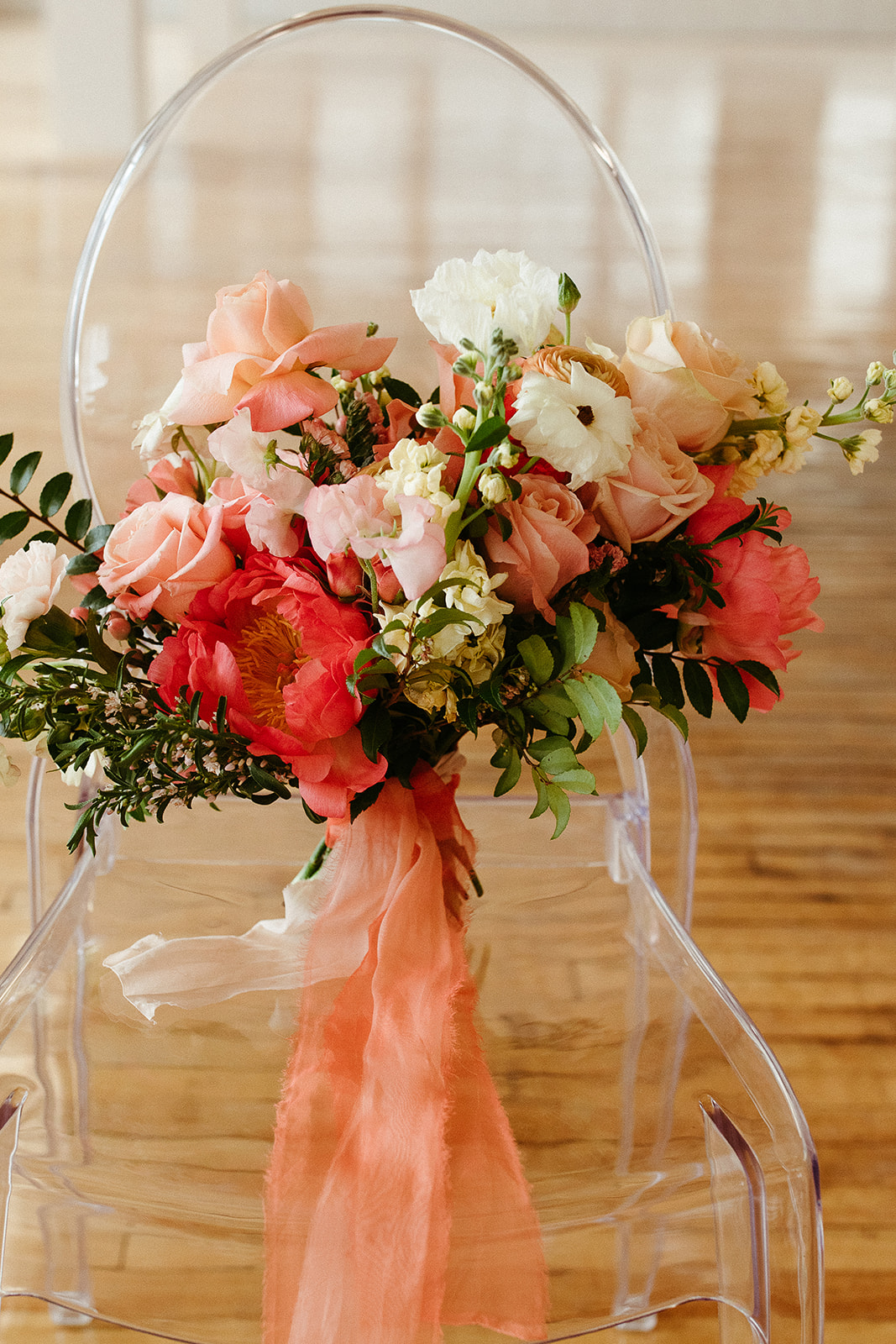 Floral design with a citrus inspired colour palette with dreamy peach, pink and grapefruit hues