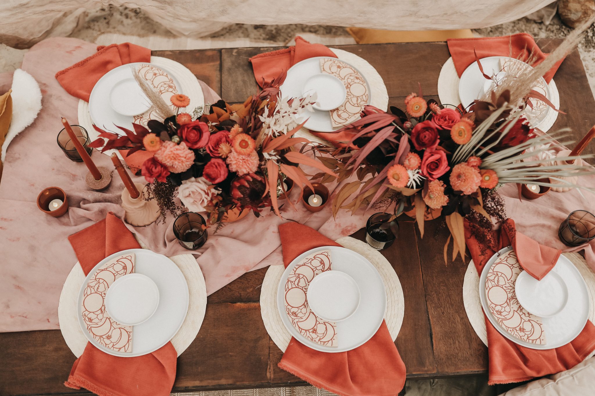 Moroccan elopement inspiration for a tablescape with moon cycle stationery and terracotta accents