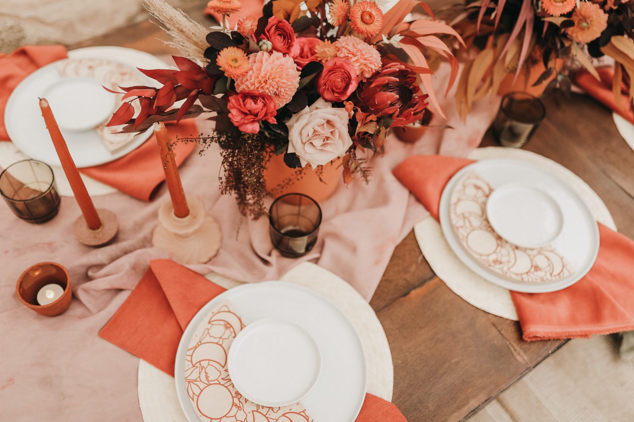 Moroccan elopement inspiration tablescape with moon cycle stationery and terracotta accents