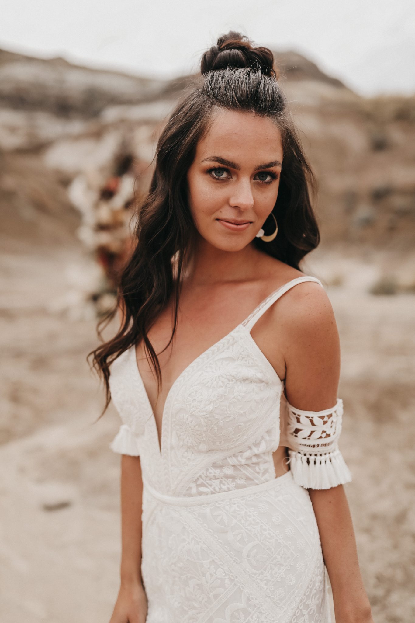Moroccan elopement inspiration boho bridal gown with lace bridal cuffs