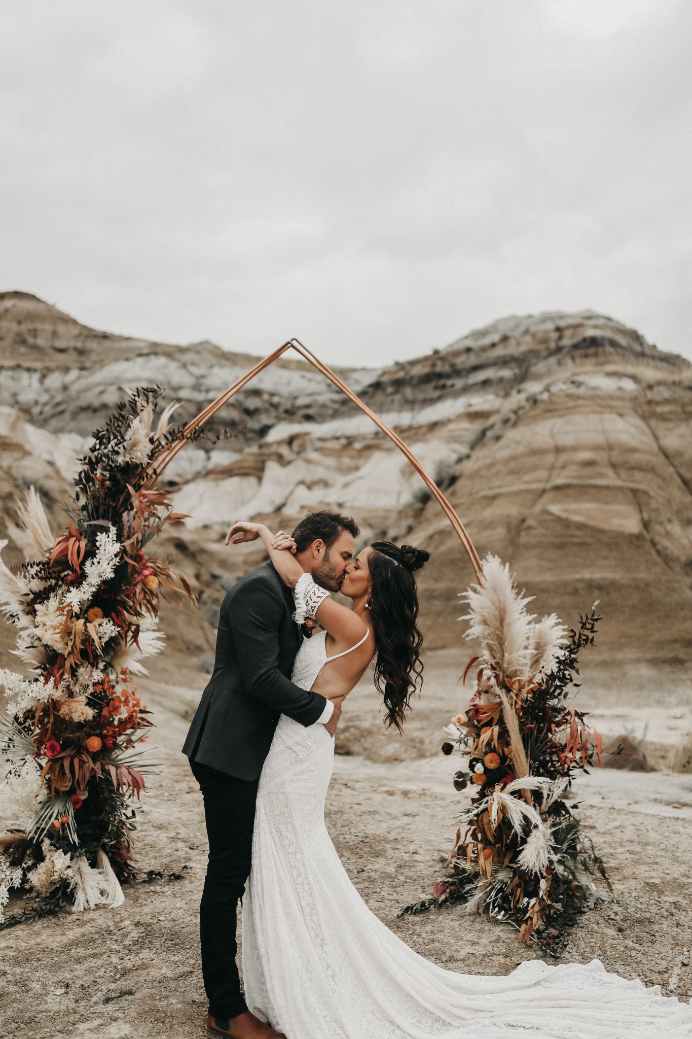 Moroccan Elopement Inspiration with dried boho florals, a copper arch and terracotta colour palette