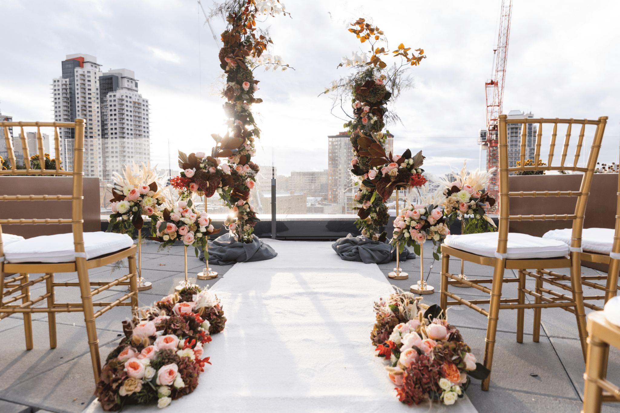 Bold upscale ceremony design on the balcony at Alchemy, one of Edmonton's newest luxury wedding venues