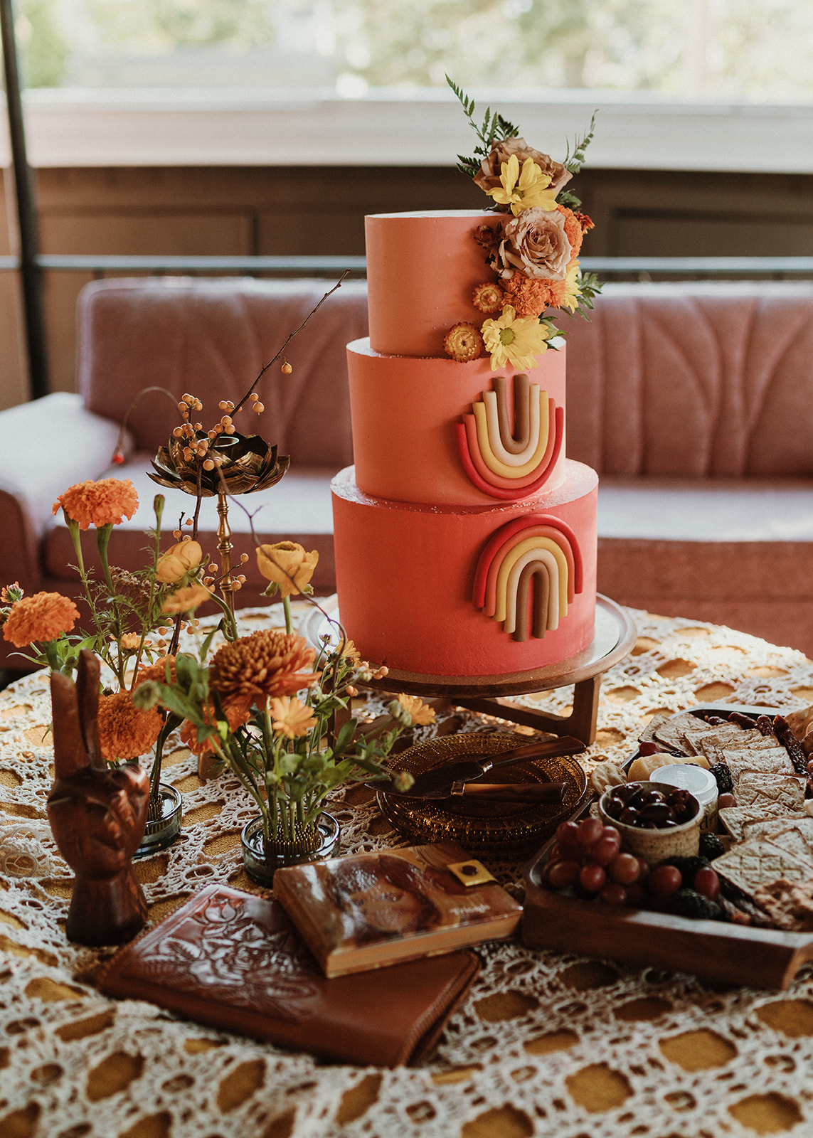 Groovy retro inspired pink and tangerine wedding cake from an Anthropologie dream 