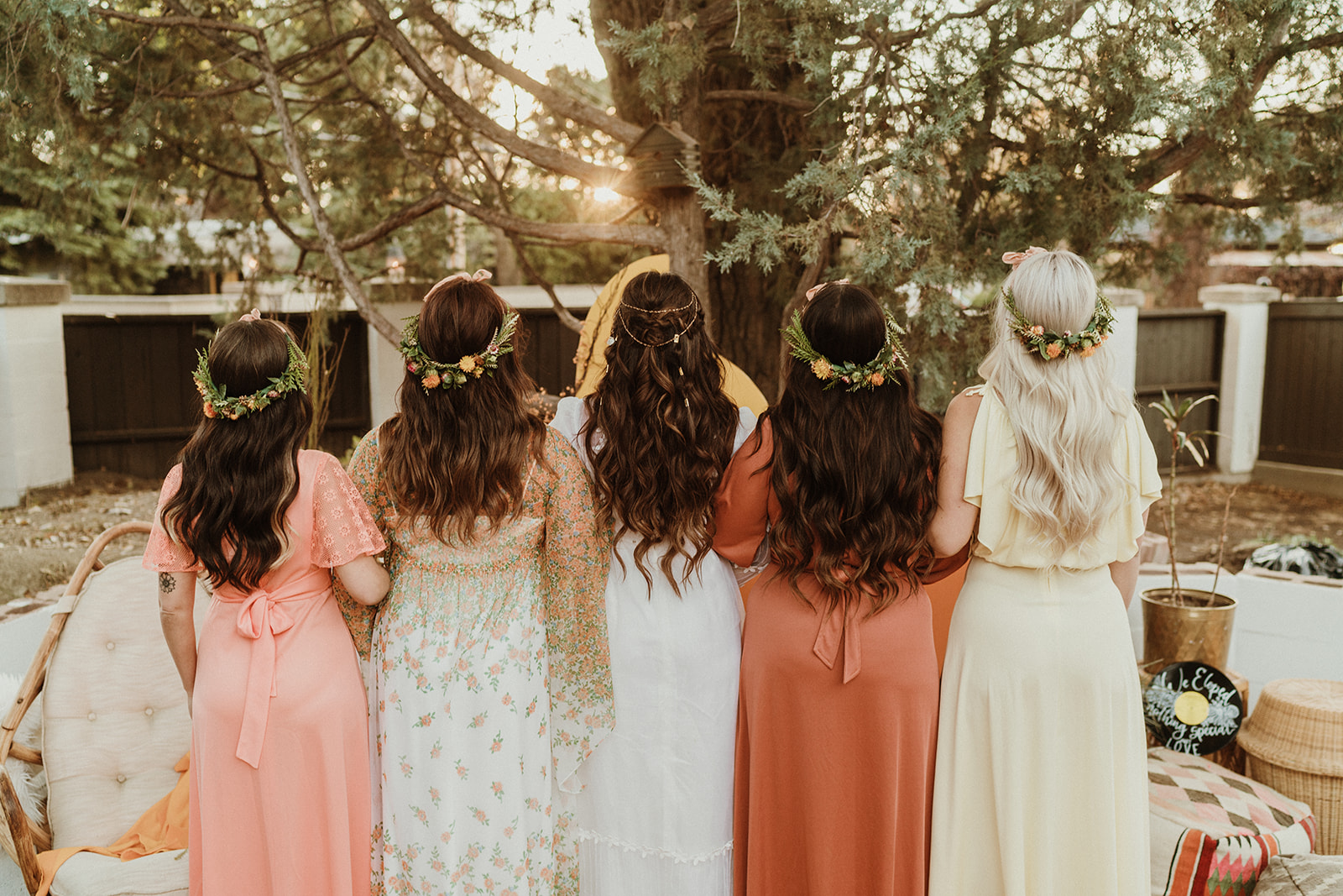 Long wavy wedding day hair with floral crowns