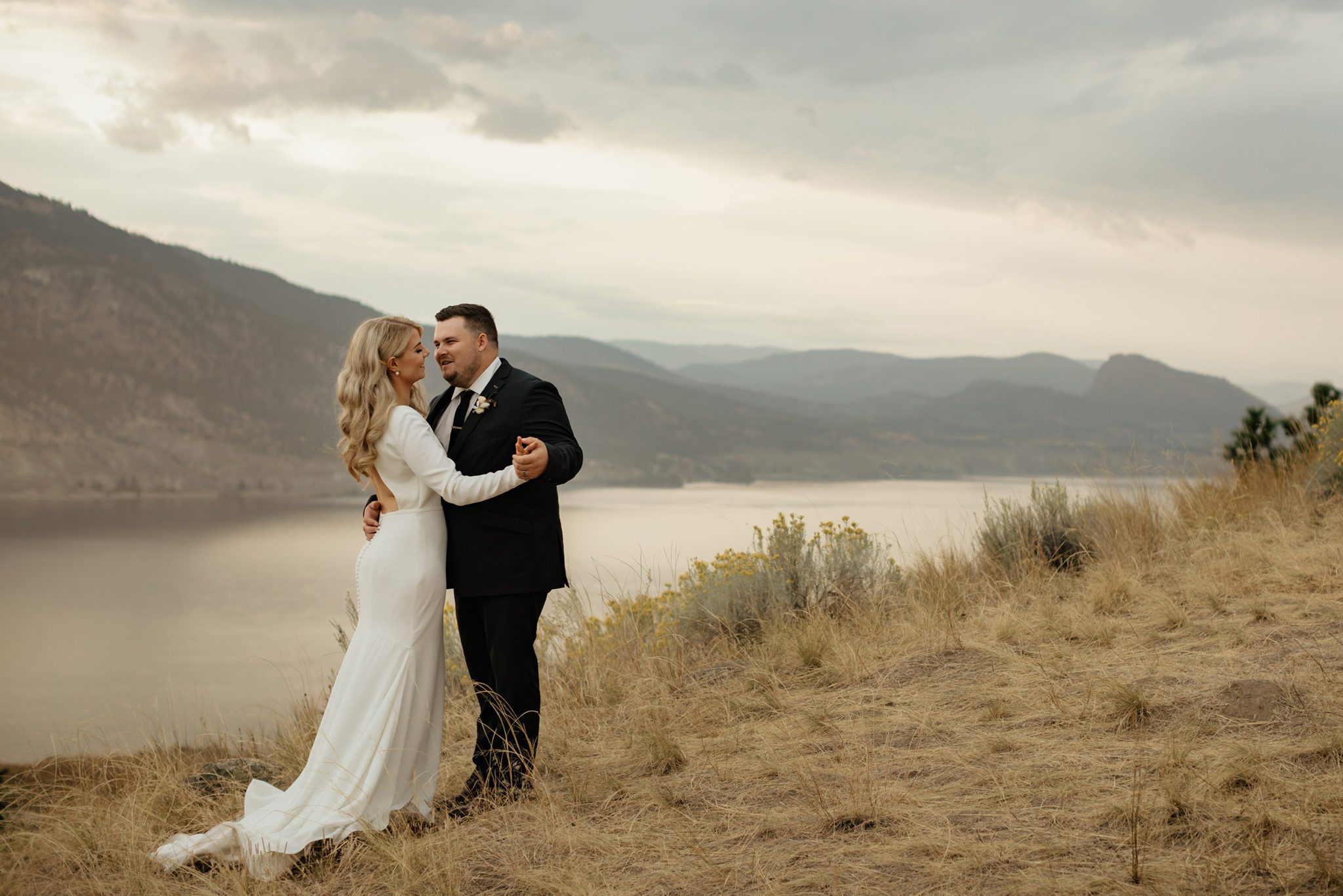 Bride and groom share a first dance overlooking the Okanagan Valley