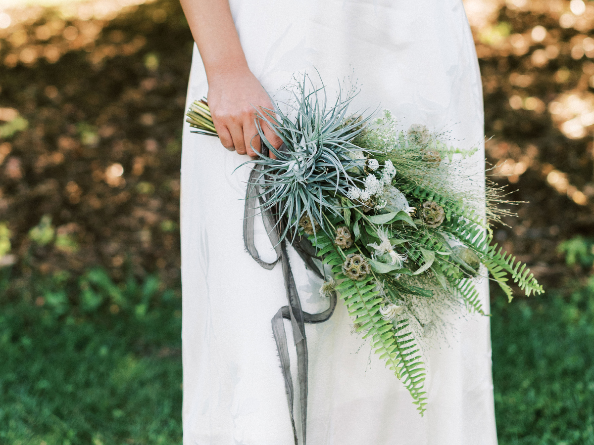 Minimal bridal bouquet for the boho bride with airplants and seed pods