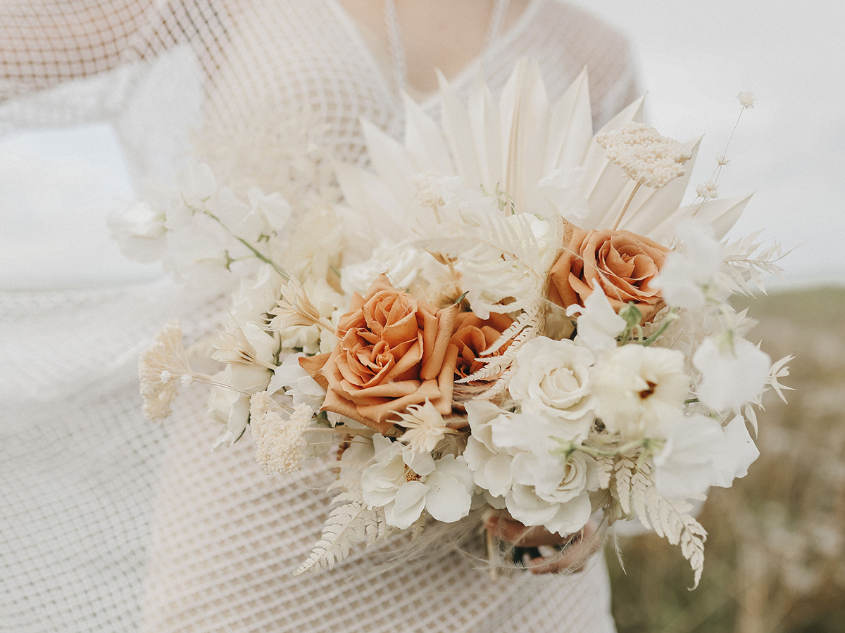 Bouquet inspiration for the boho bride with palm fronds and toffee roses