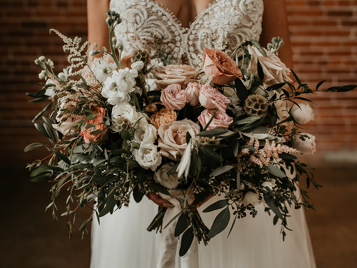 Wild and earthy bridal bouquet for the boho bride with pink and toffee hues