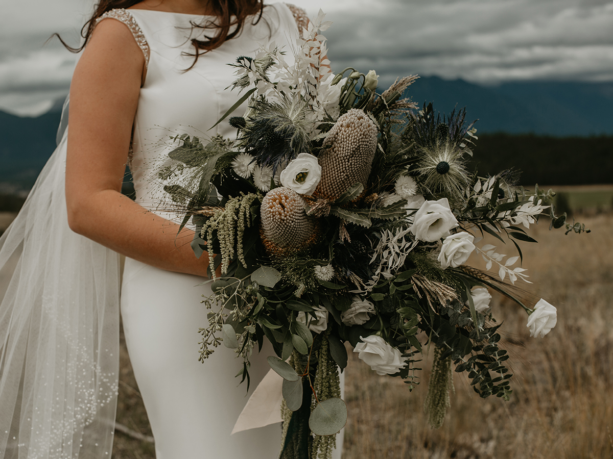 Moody and earthy boho bouquet inspiration with thistle and dried florals