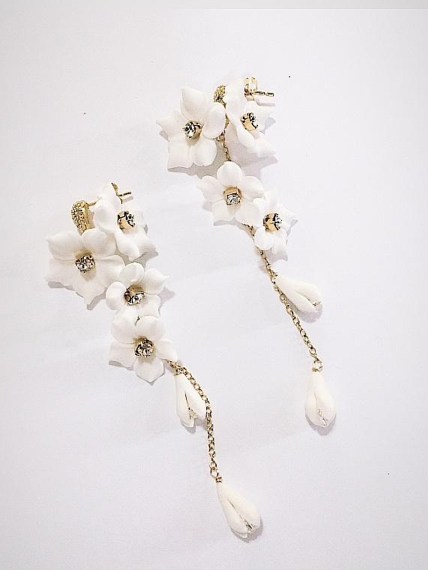 White flower inspired statement earrings by Canadian jewelry designer Joanna Bisley Designs