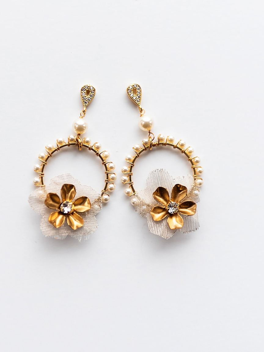 Gold flower inspired statement earrings from Canadian bridal jewelry designer Joanna Bisley Designs