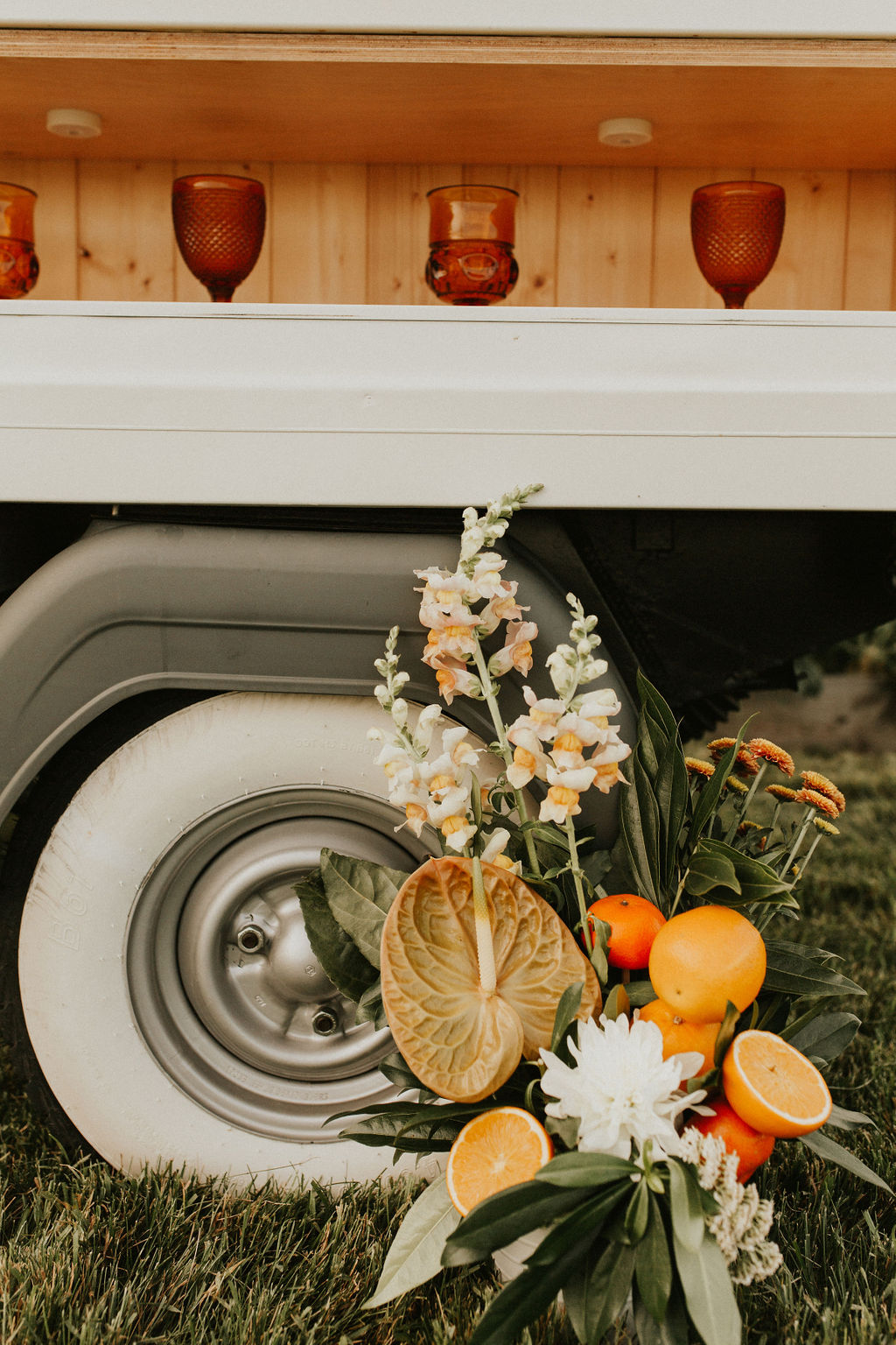 Prosecco mobile bar cart decorated for a tangerine inspired wedding editorial at The Gathered, a wedding venue near Calgary Alberta