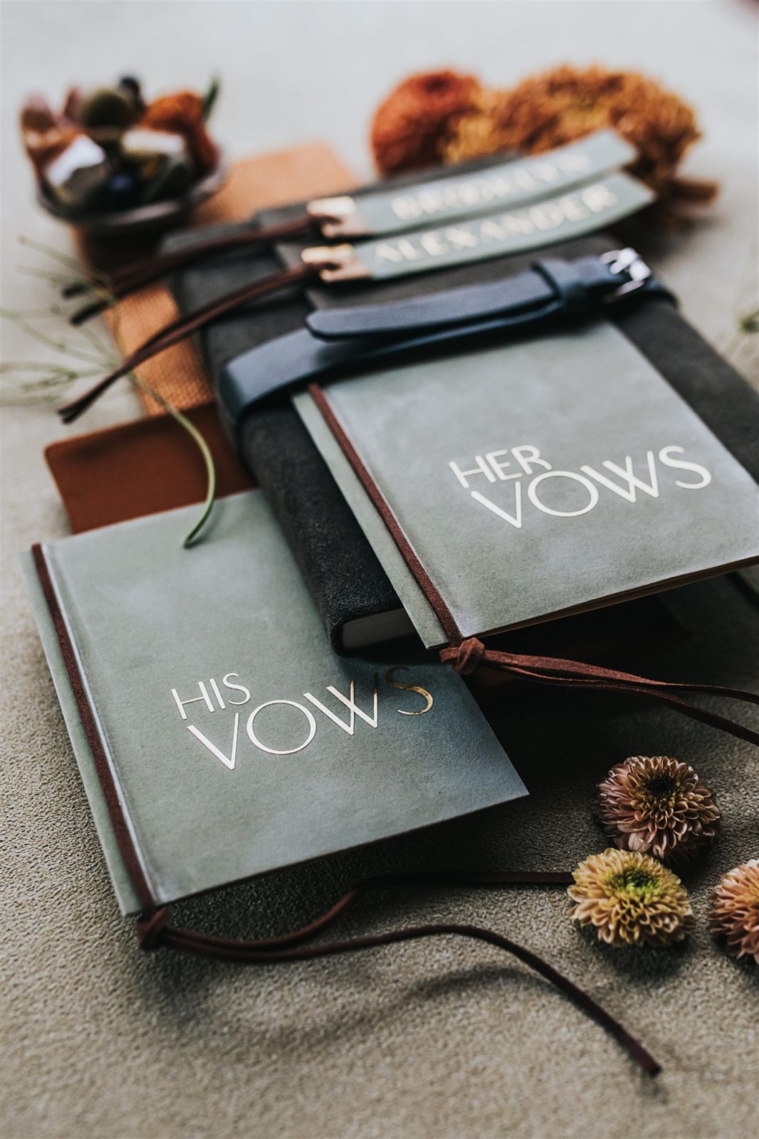 Textured his and her vow booklets for a moody fall wedding