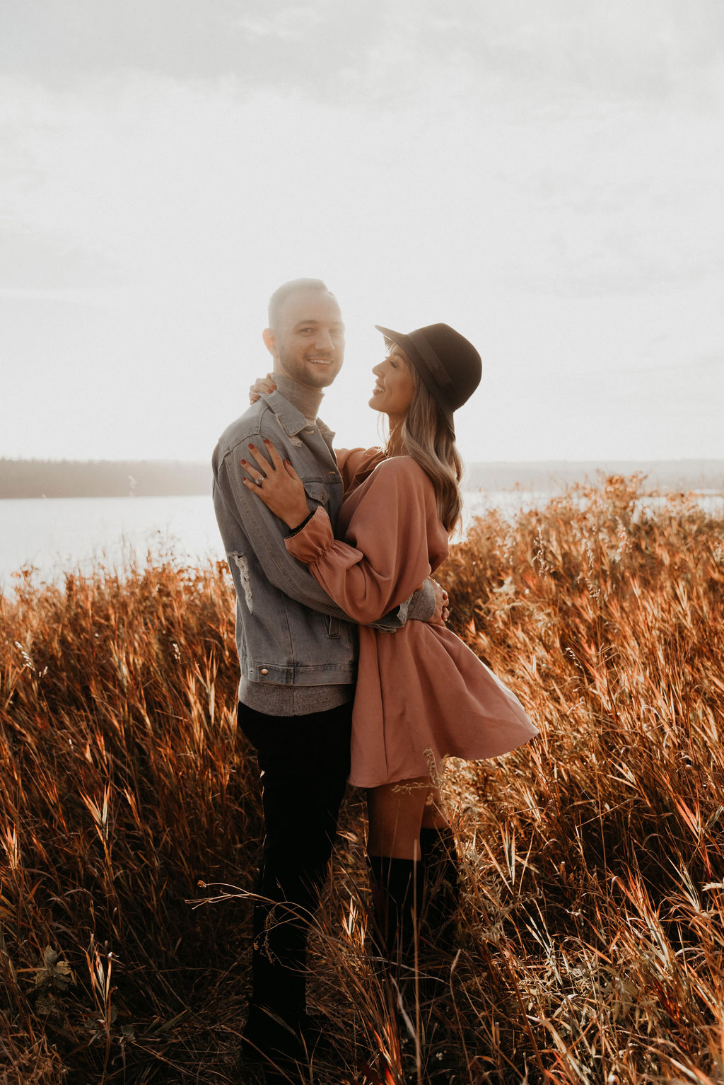 Sunset engagement session outfit inspiration with a denim jacket and cute blush dress