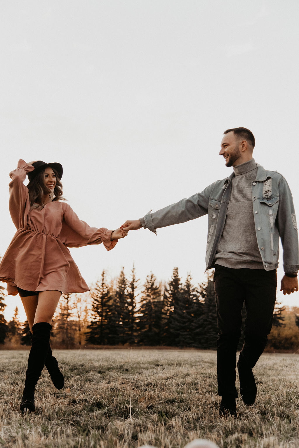 Engagement session outfit inspiration with blush dress and denim jacket