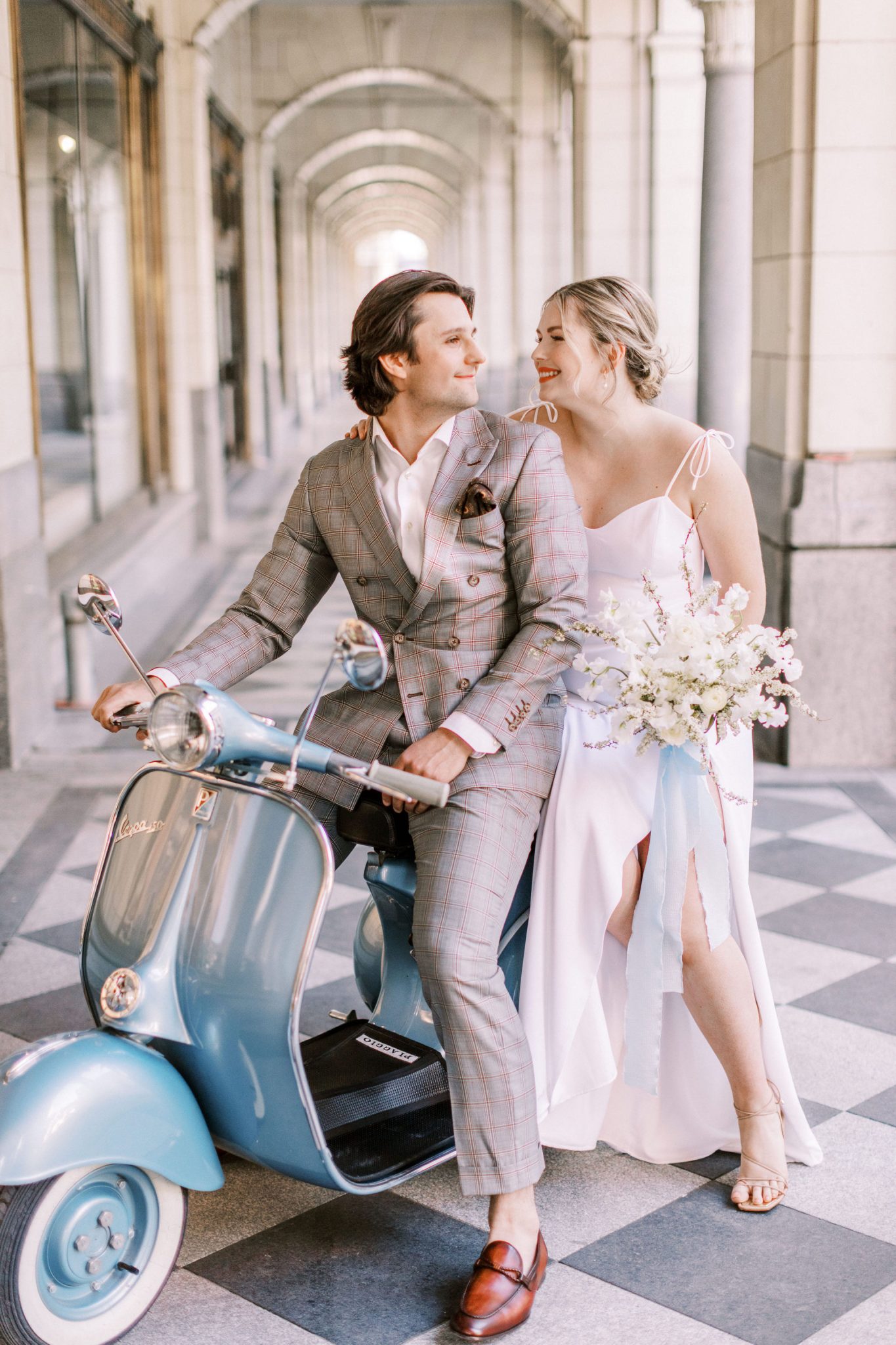 Robin blue inspired downtown elopement with vespa rental