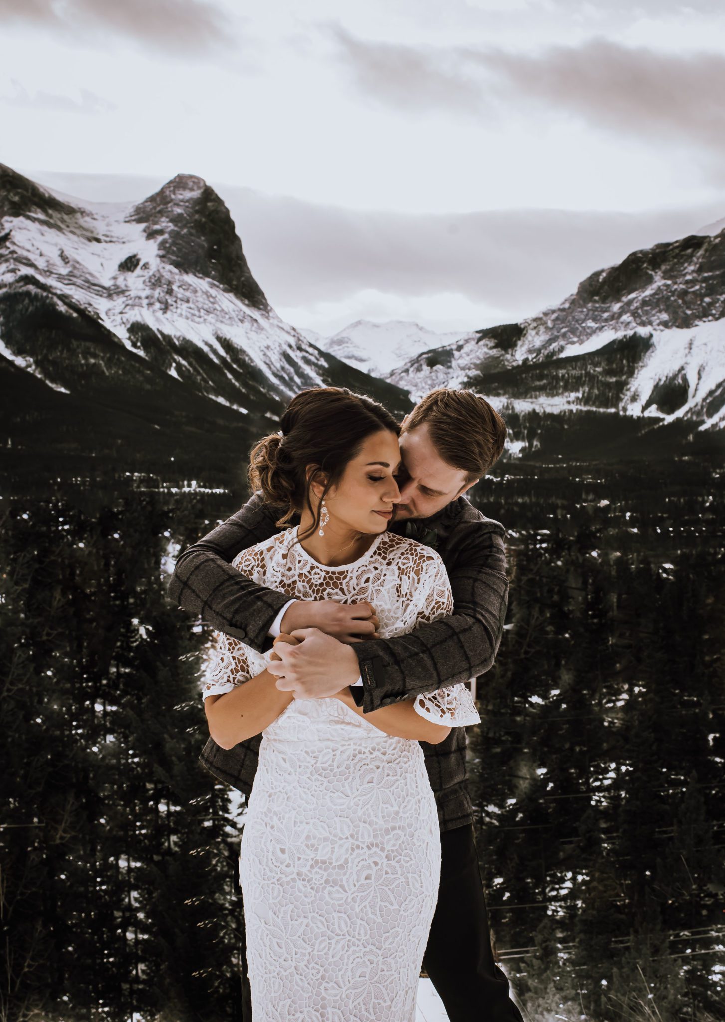 Canmore winter wedding inspiration with the Rocky Mountains in the background