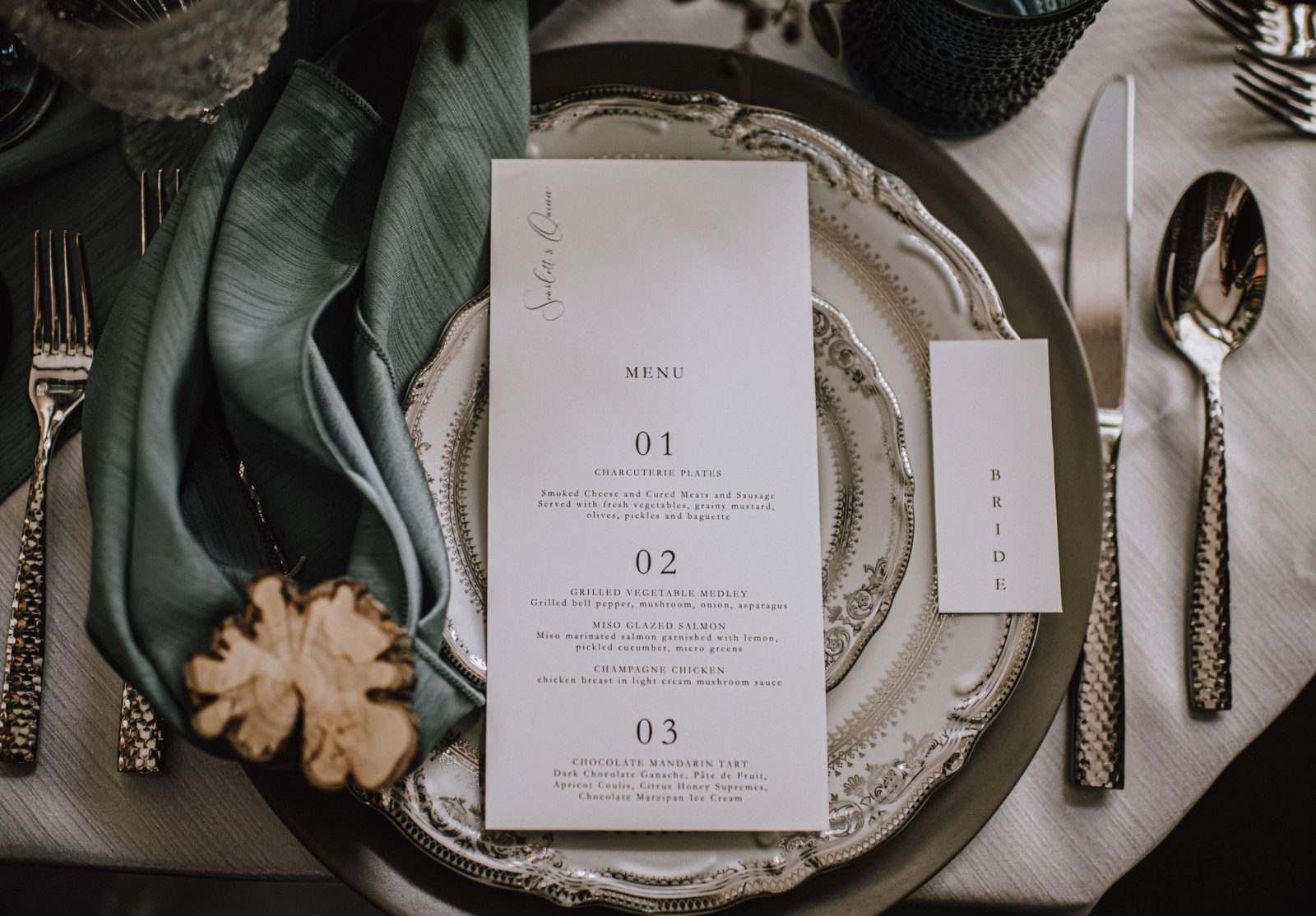 Wedding menu design inspiration with dusty blue and silver accents for a moody winter wedding