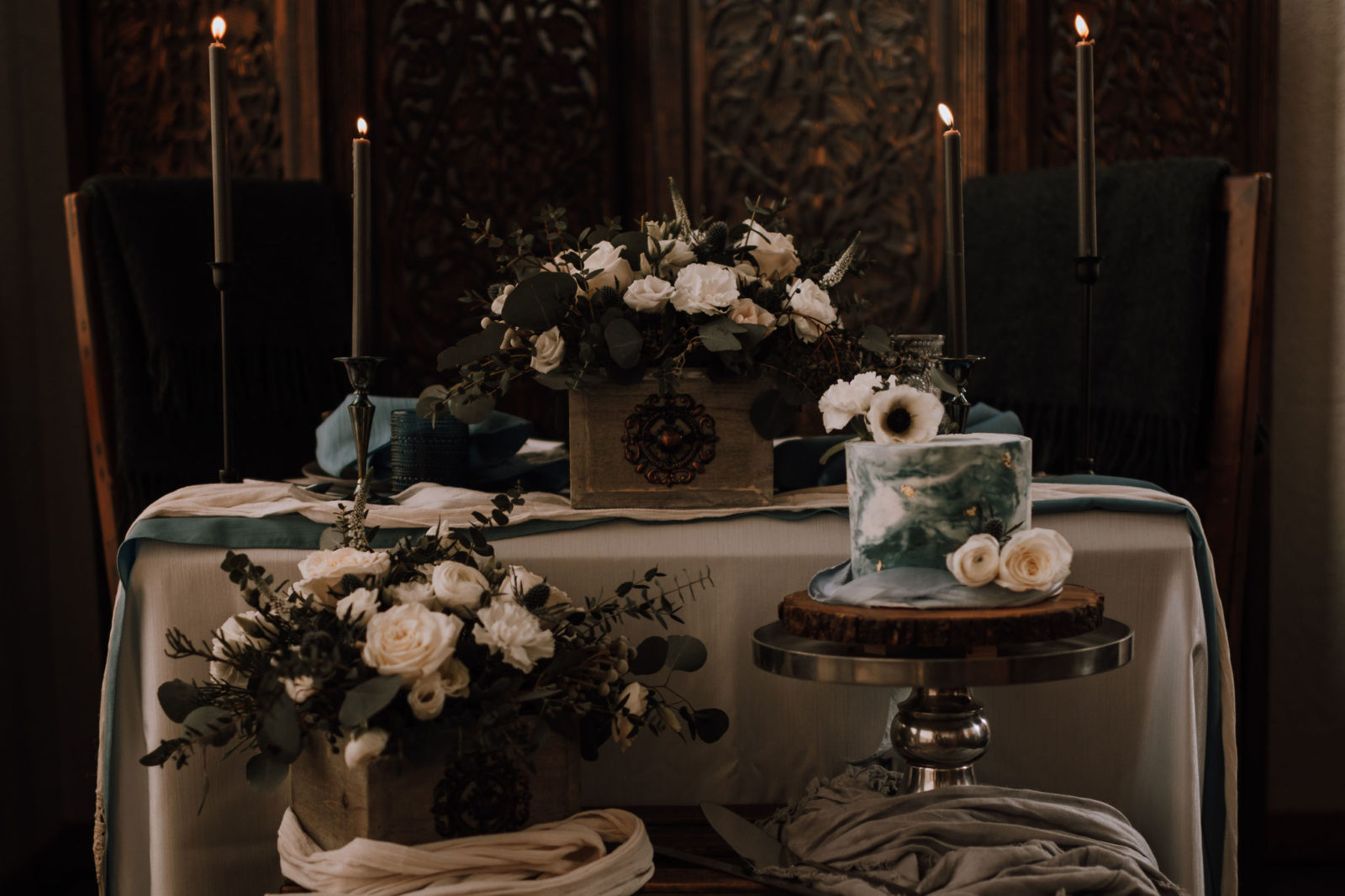 Moody and luxurious sweetheart table decor inspiration for a vintage winter wedding in Canmore Alberta