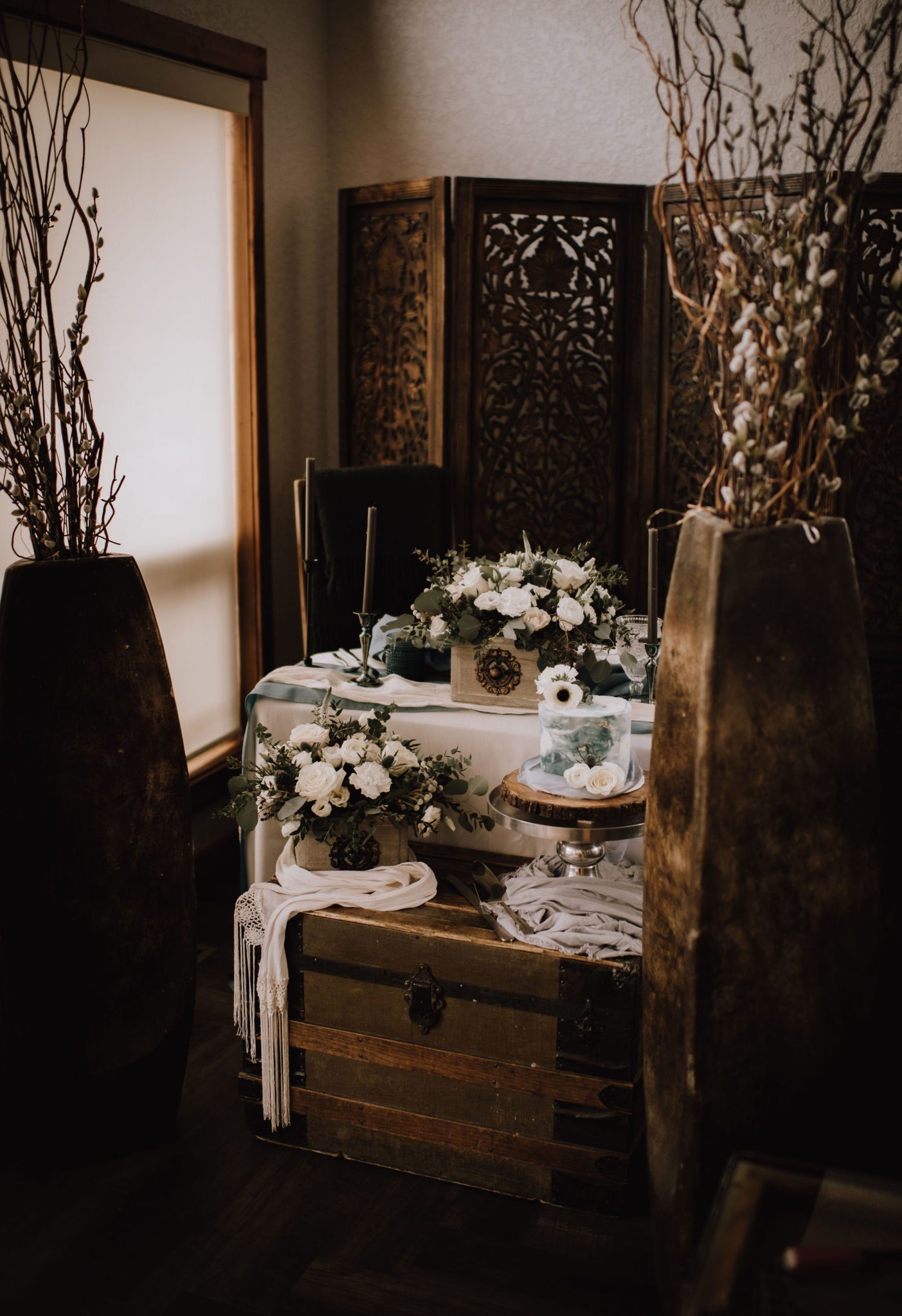Vintage inspired sweetheart table design or a winter wedding in Canmore Alberta with dusty blue accents