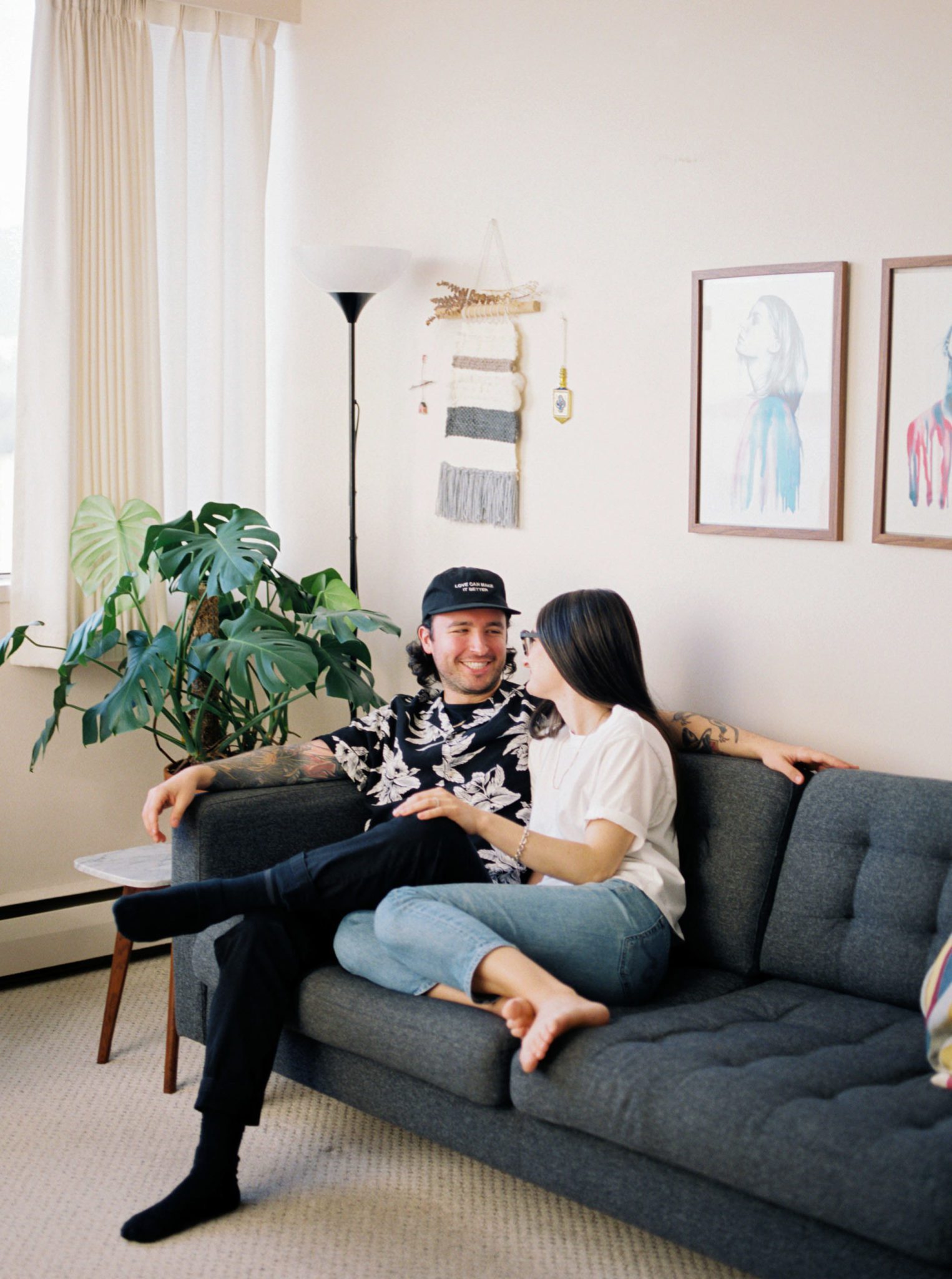 Bold living room engagement session with retro vibes