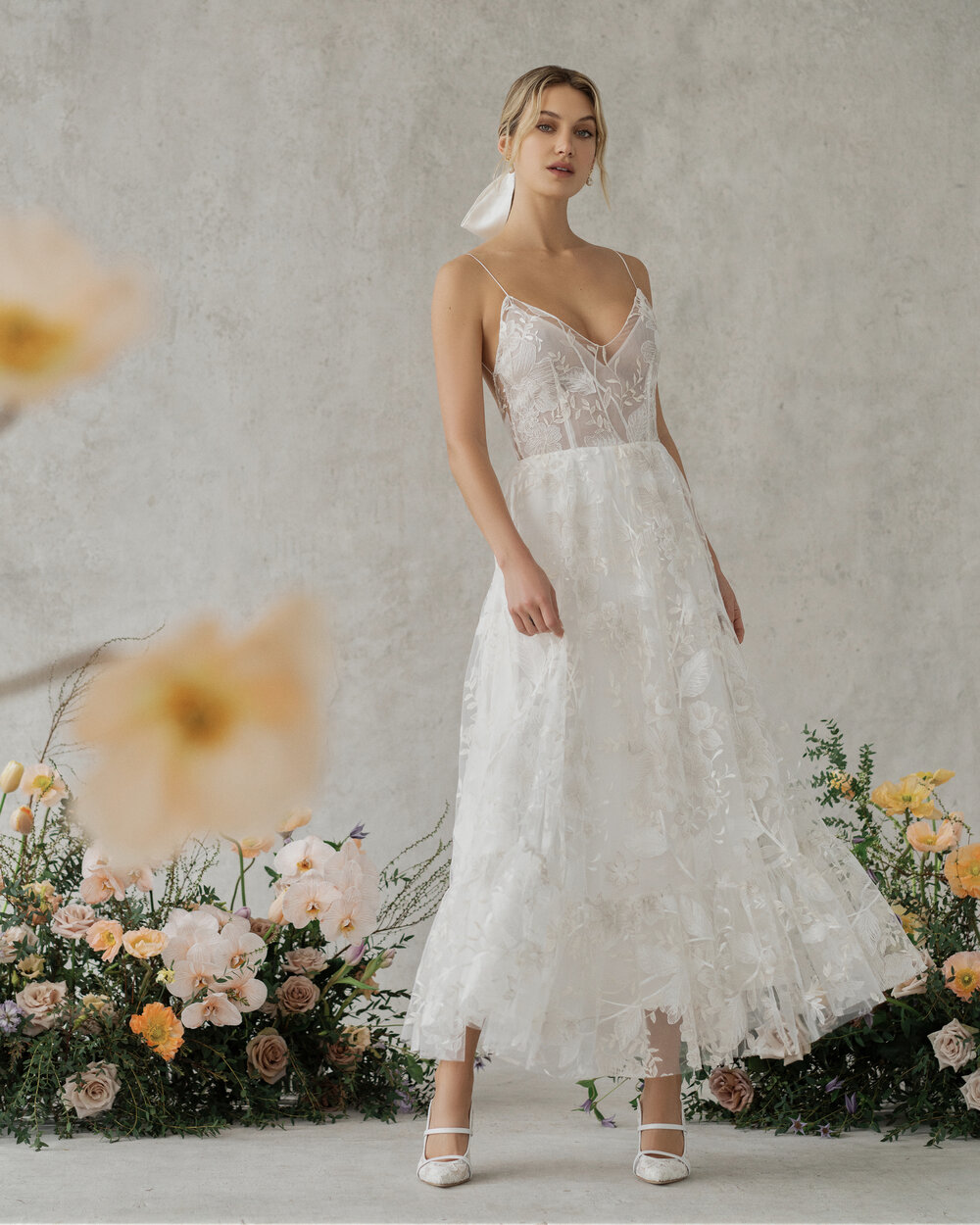Flirty floral Alexandra Grecco gown perfect for your bridal shower or wedding reception