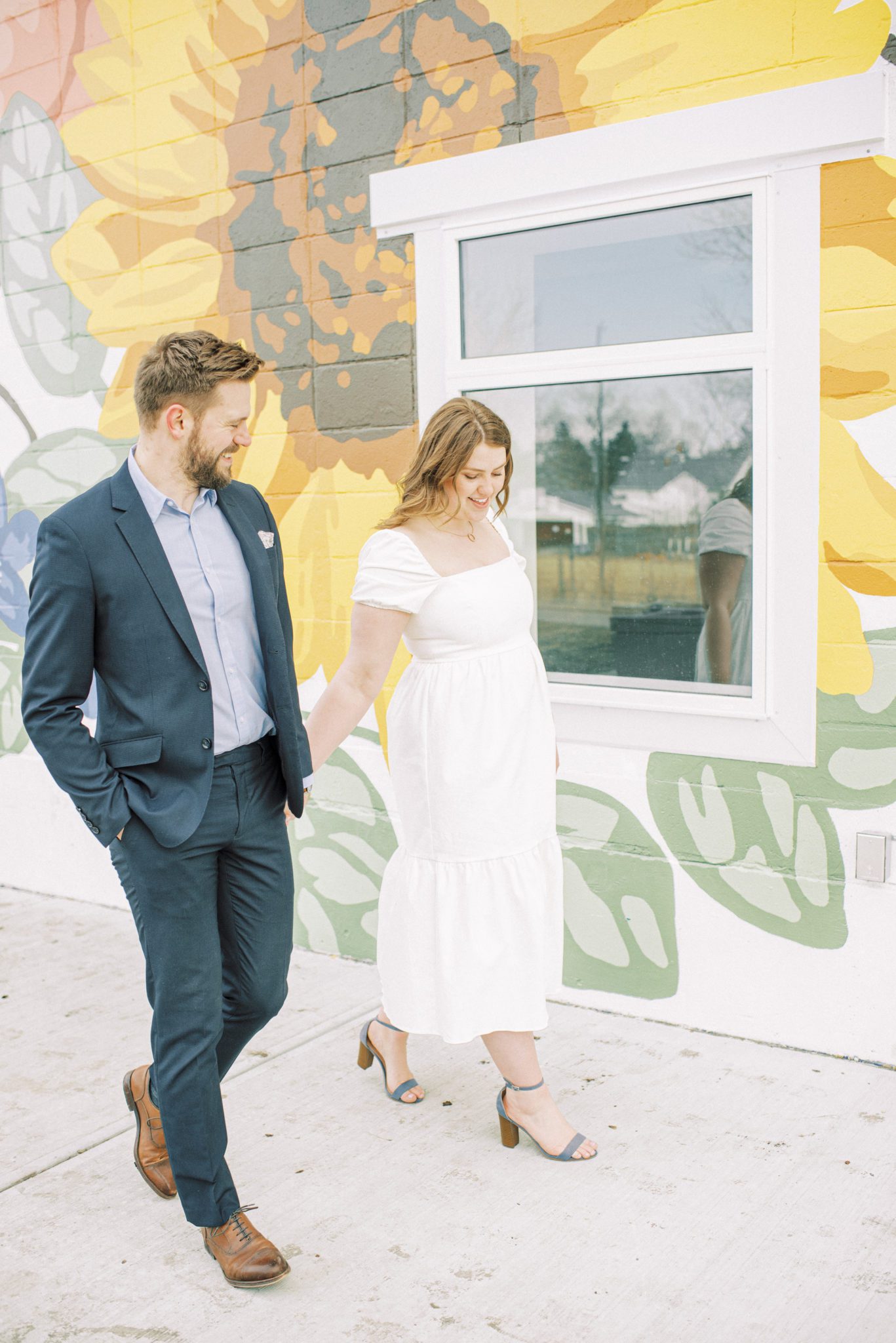 Sunflower wall art in Edmonton Alberta for an engagement session filled with props