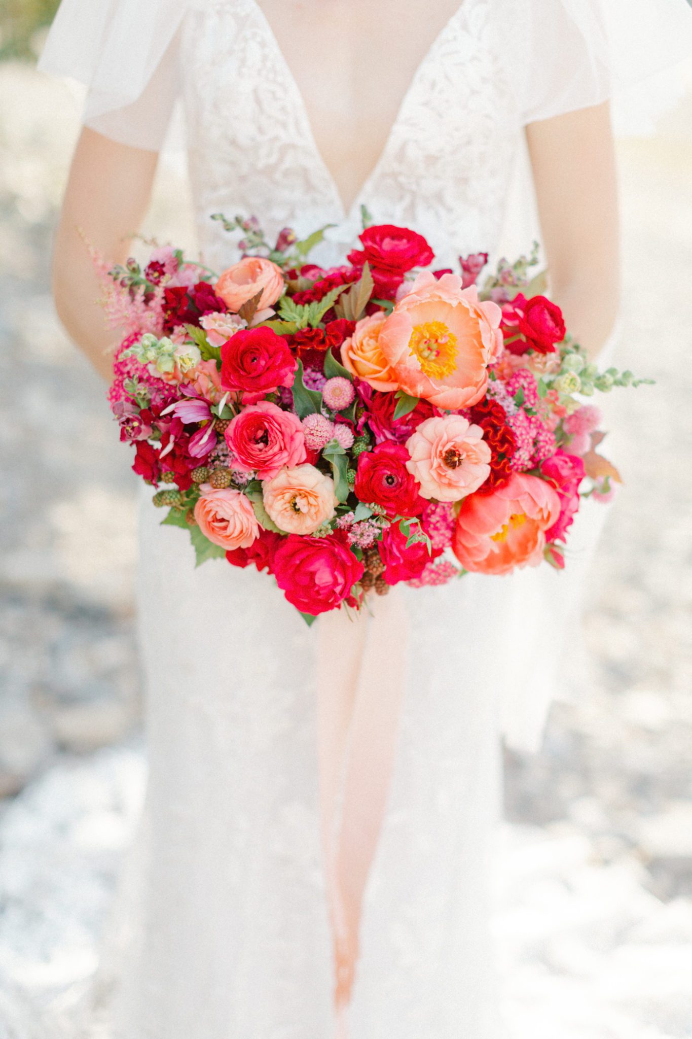 Vibrant red and orange bridal bouquet