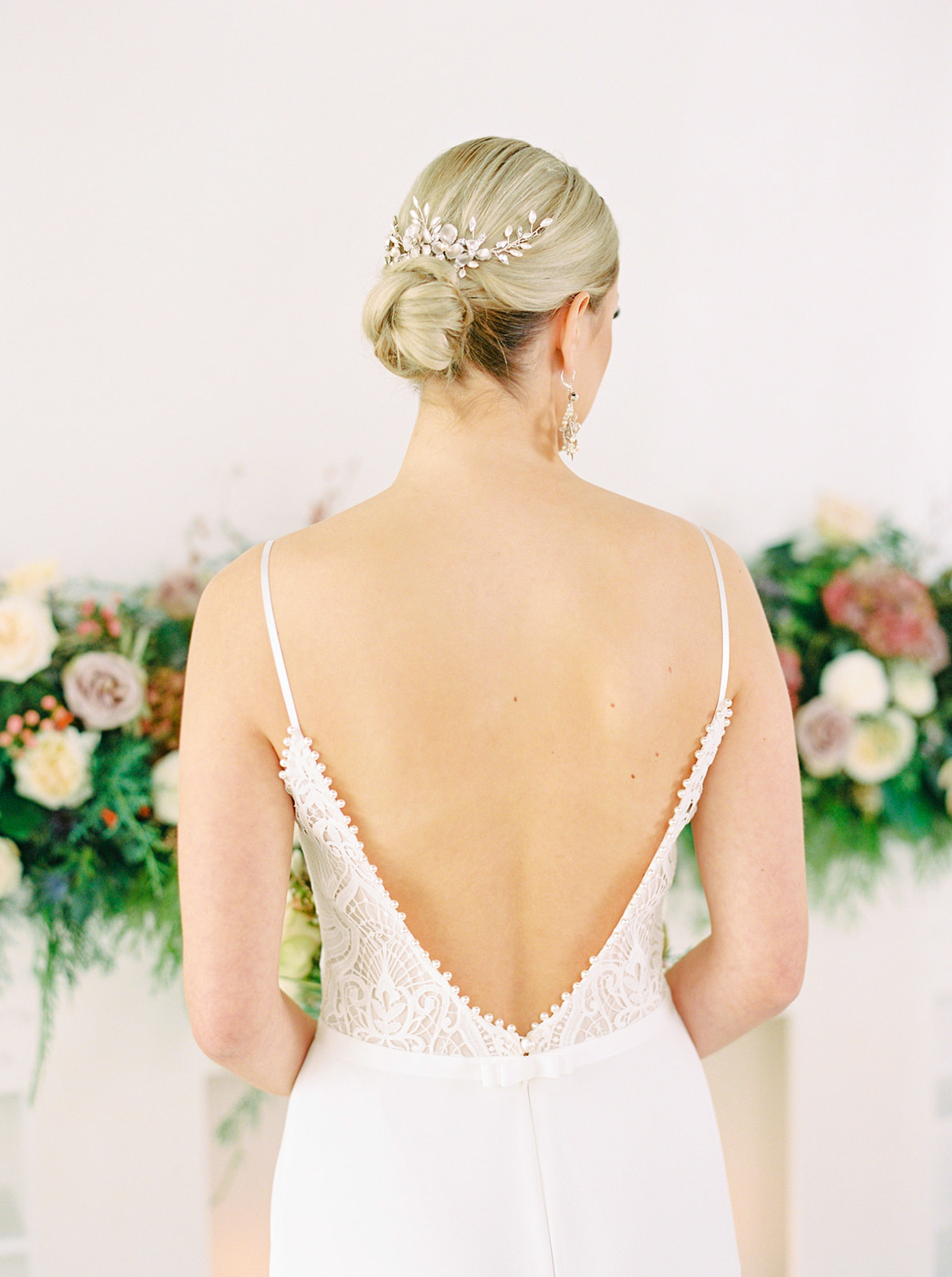 Lace and pearl open back wedding gown for the elegant bride
