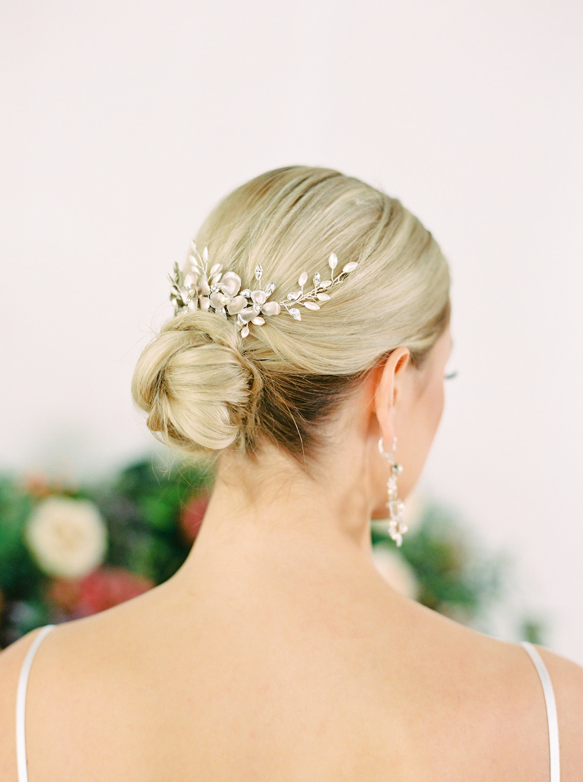 Elegant bridal updo with a Joanna Bisley hairpiece