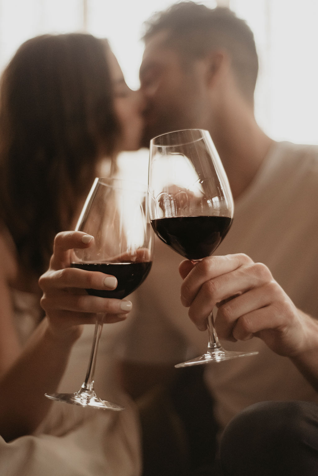 Urban and chic couple shares wine