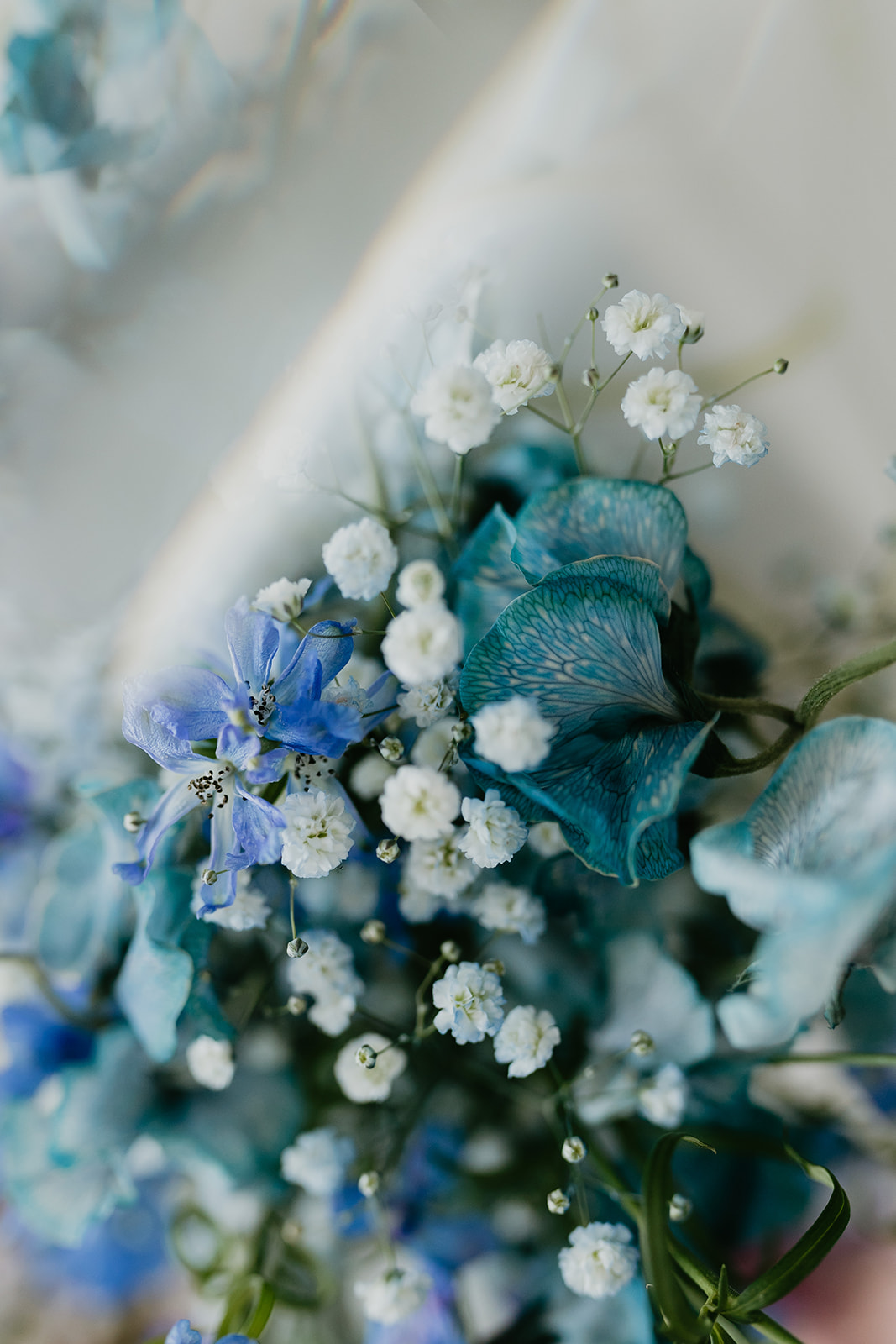 Blue wedding flowers with baby's breath
