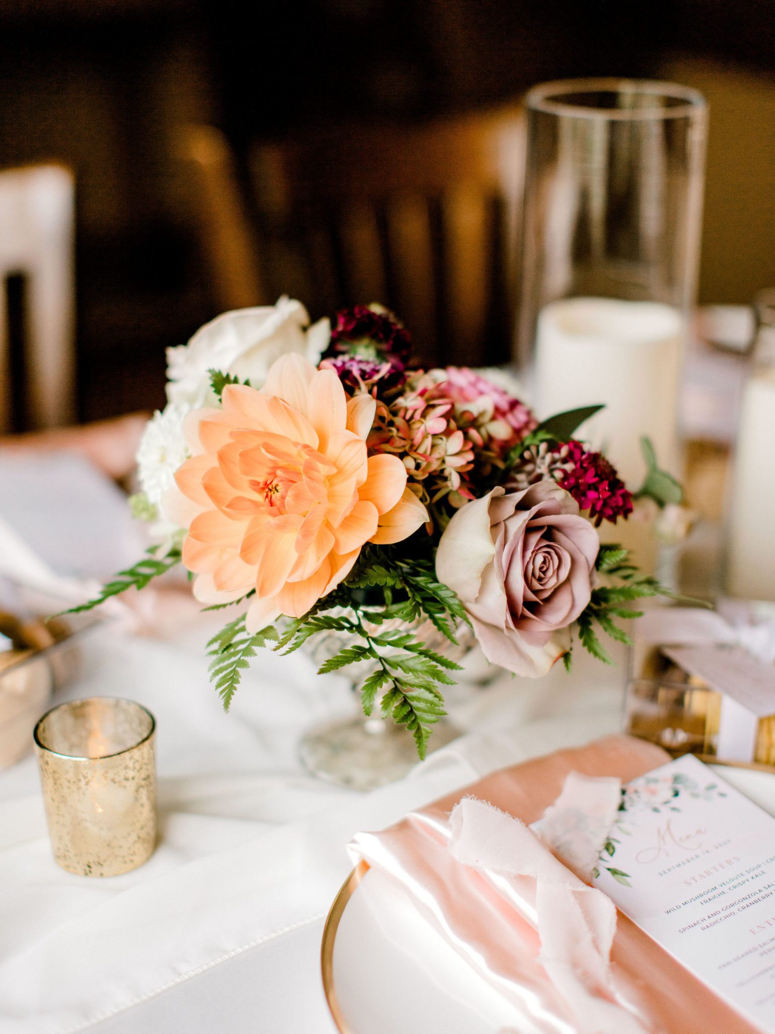 Lavish floral centrepieces for this Bow Valley Ranch Restaurant Wedding