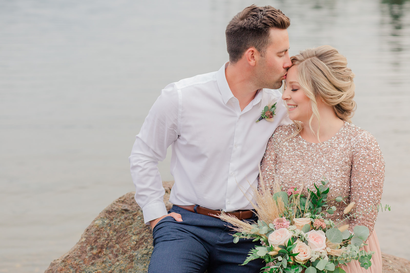 Lakeside bride and groom elopement with sparkling blush gown