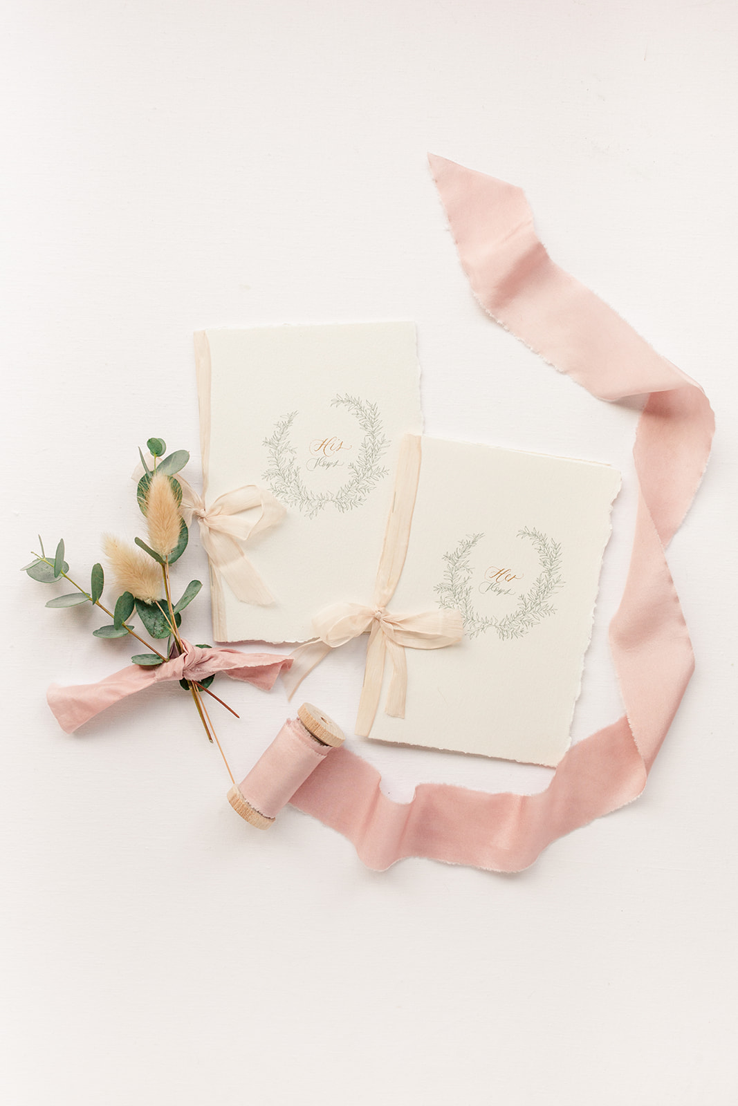 Romantic pink and white wedding vowbooks for eloping couples
