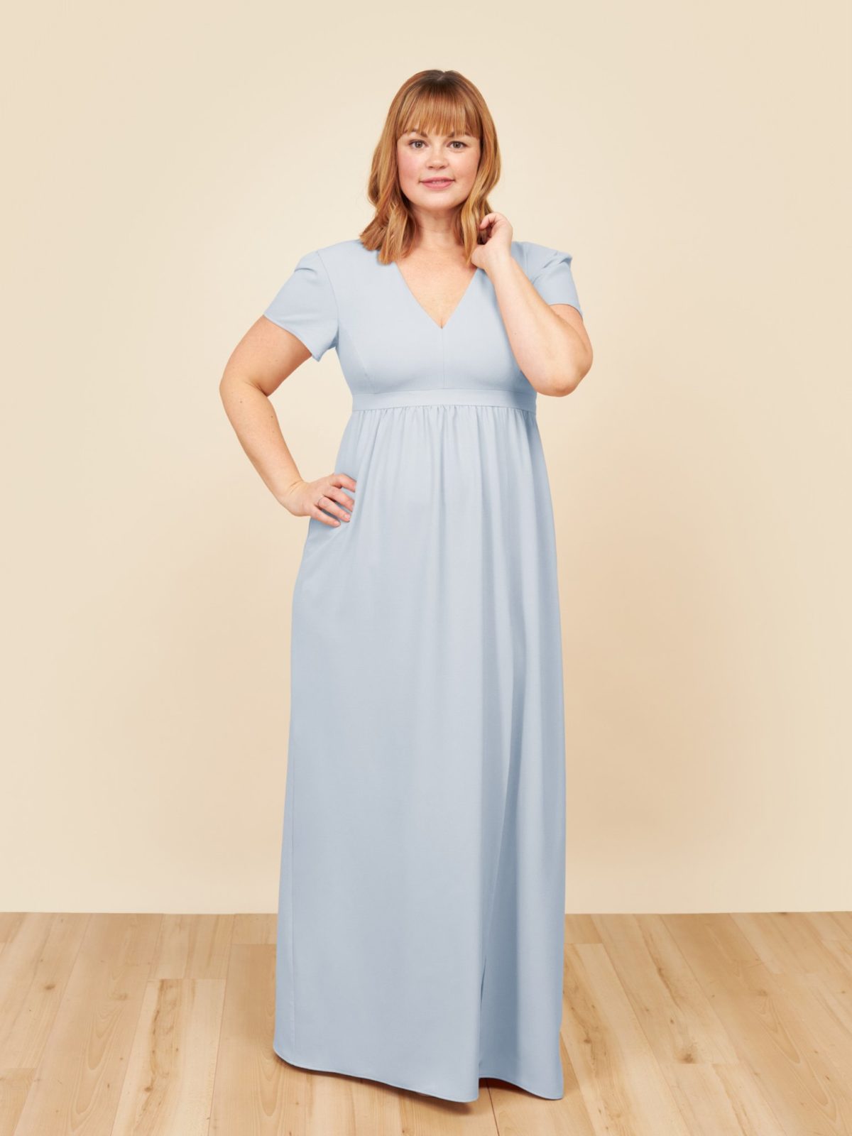 Light blue bridesmaid dress with sleeves perfect for a spring wedding