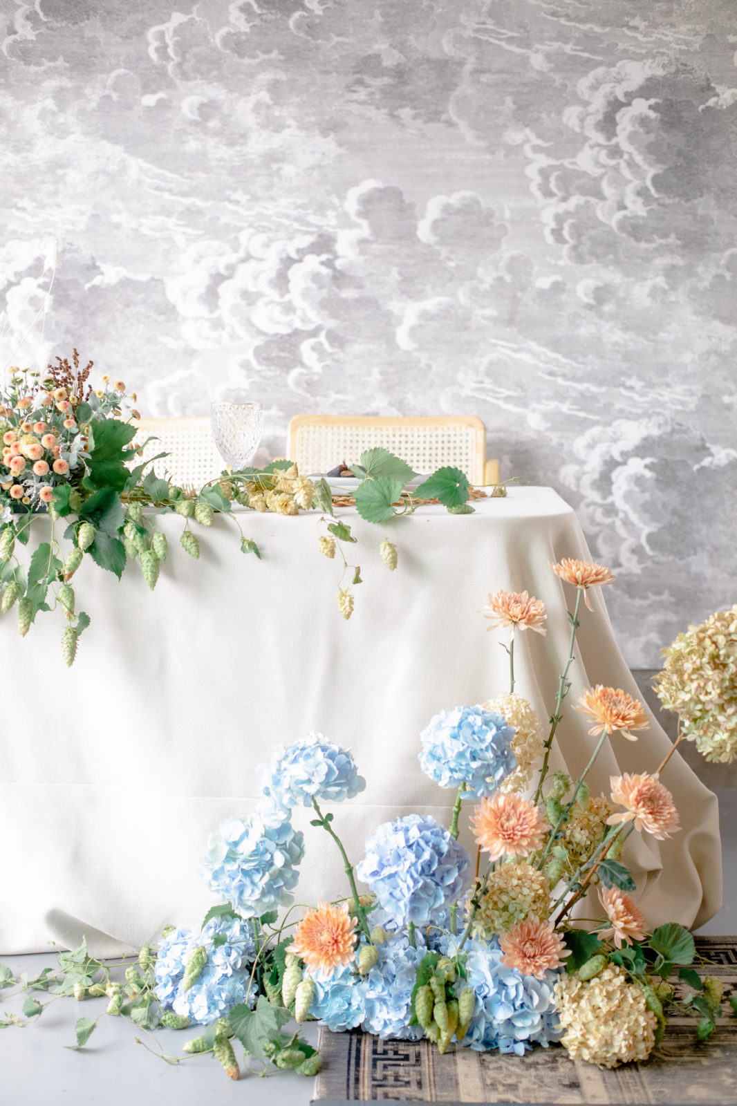 Romantic sweetheart table with whimsical pastel florals