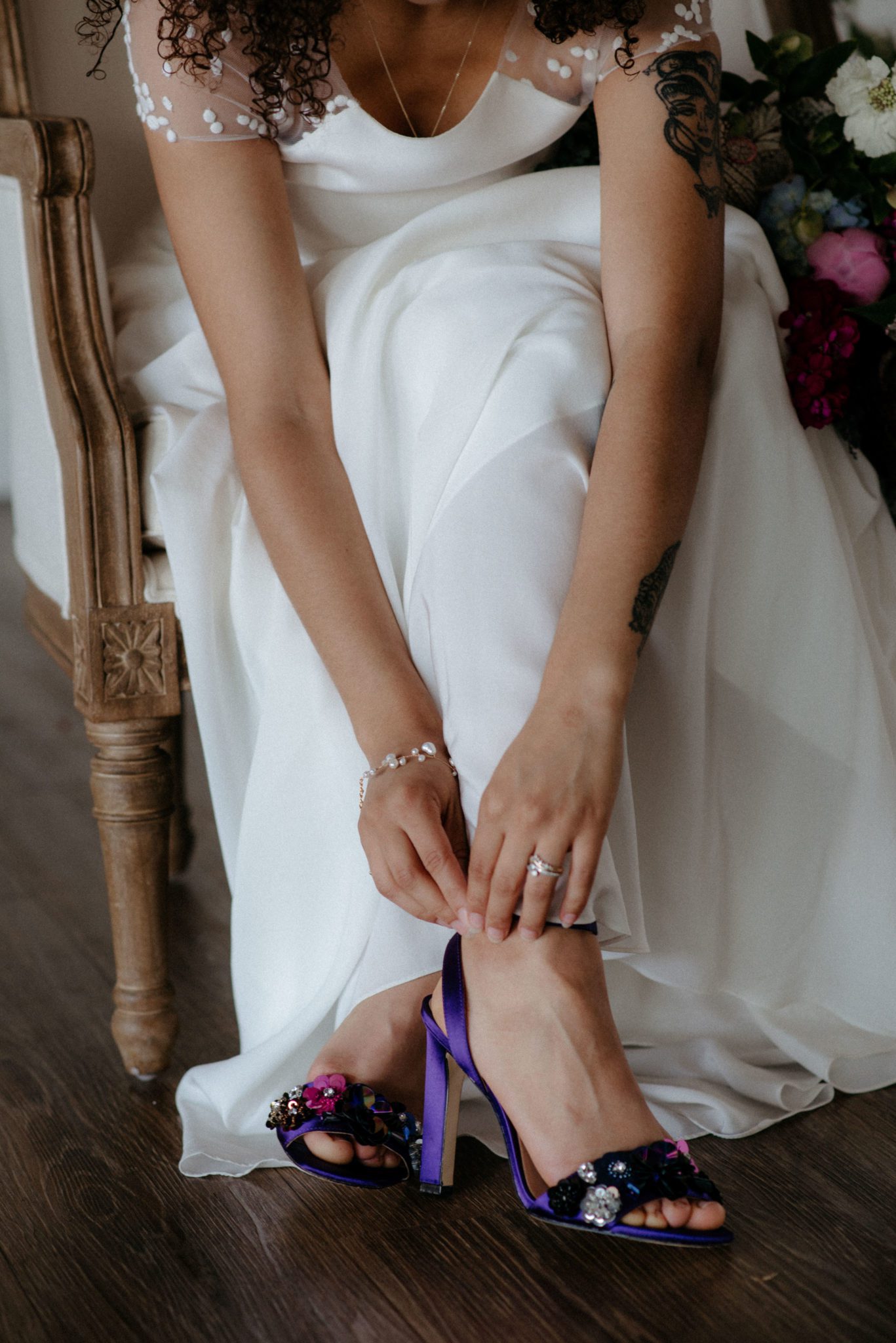 Purple bridal heels adorned with florals