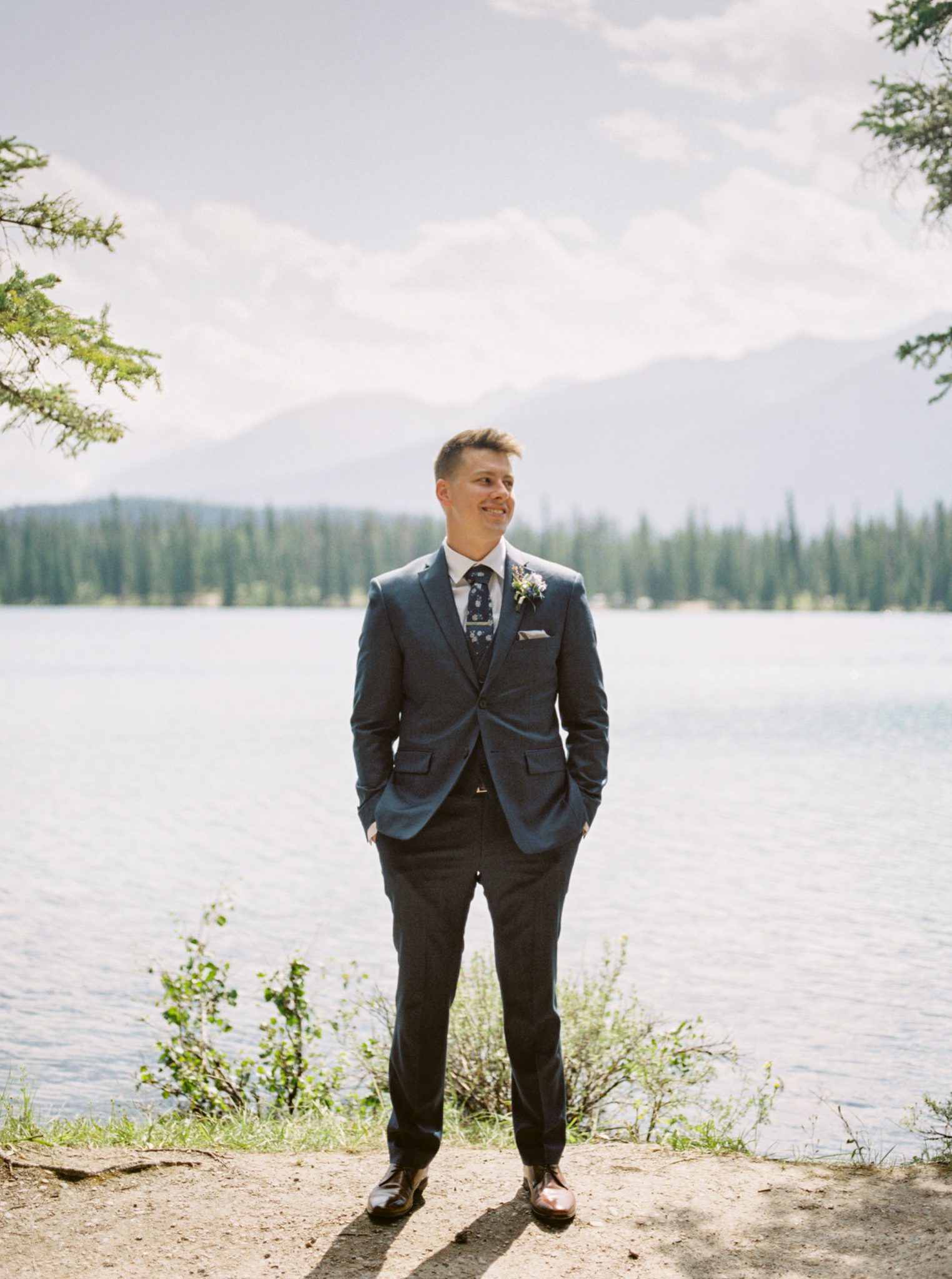 Groom attire inspiration in a navy suit