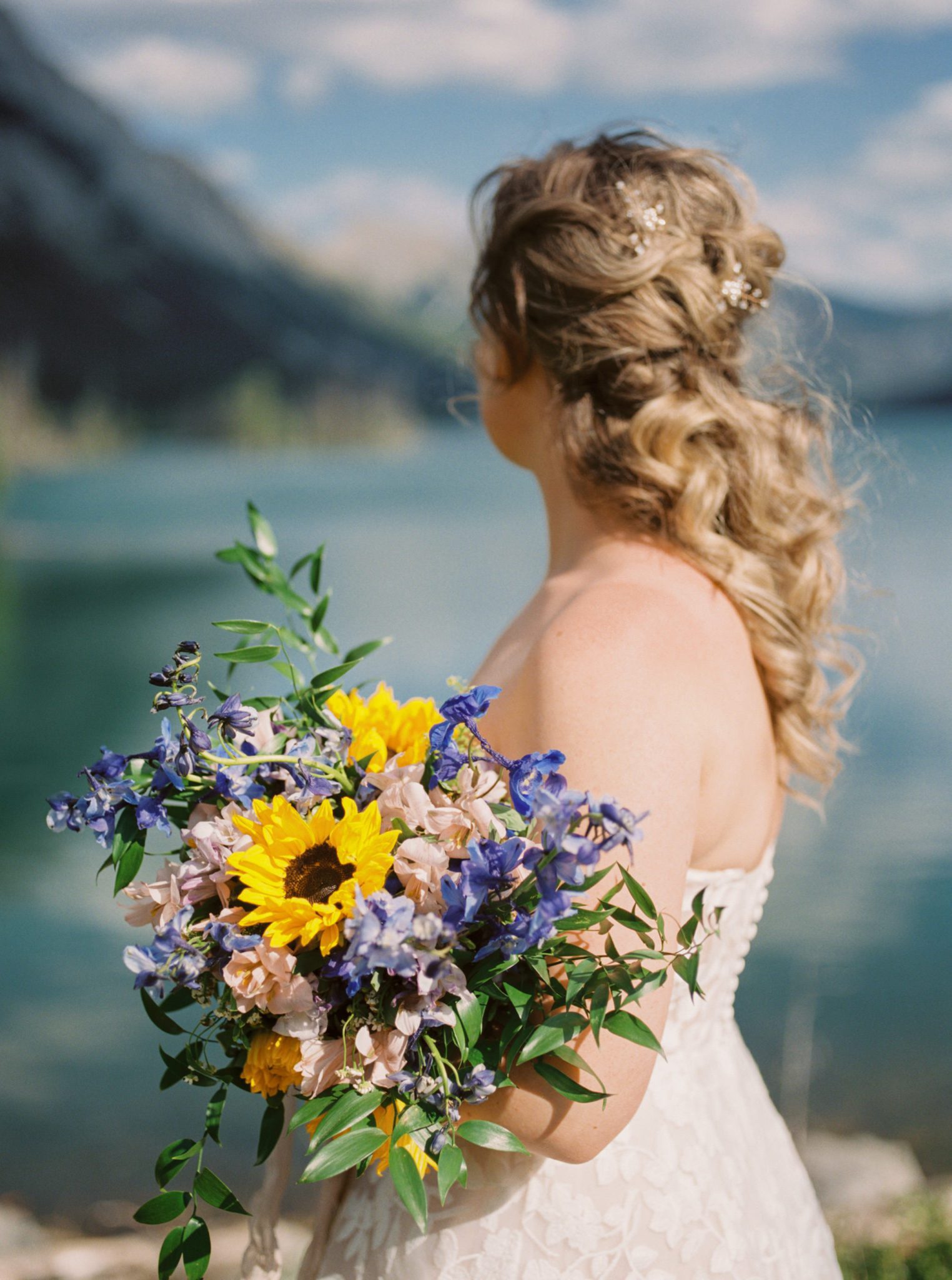 Sunflowers and wildflowers bridal bouquet for a mountain wedding